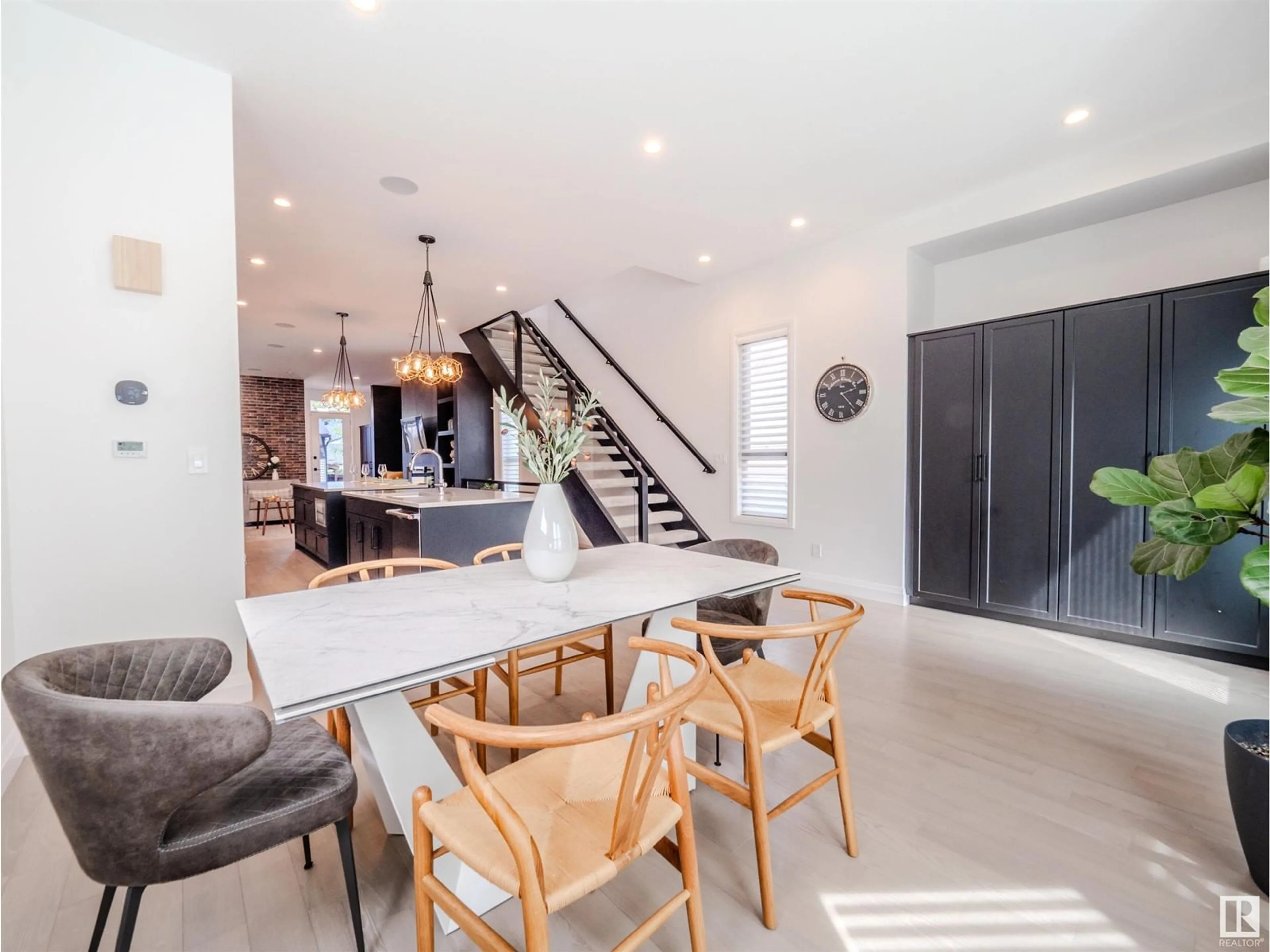 Open concept kitchen, cement floor for NW - 10732 128 ST, Edmonton Alberta T5R0Z8