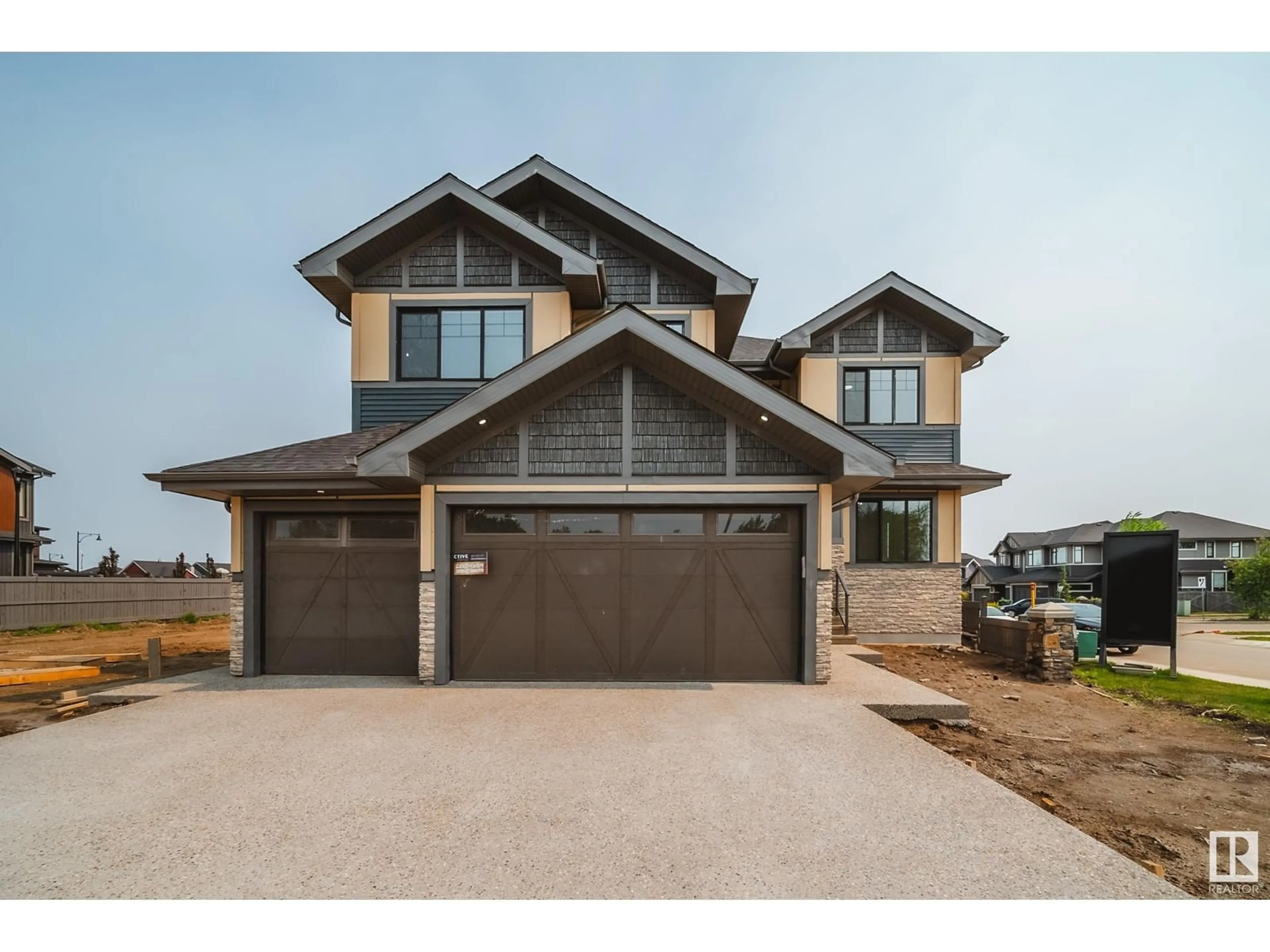 Home with brick exterior material, street for 4004 GINSBURG CR, Edmonton Alberta T5T4V2