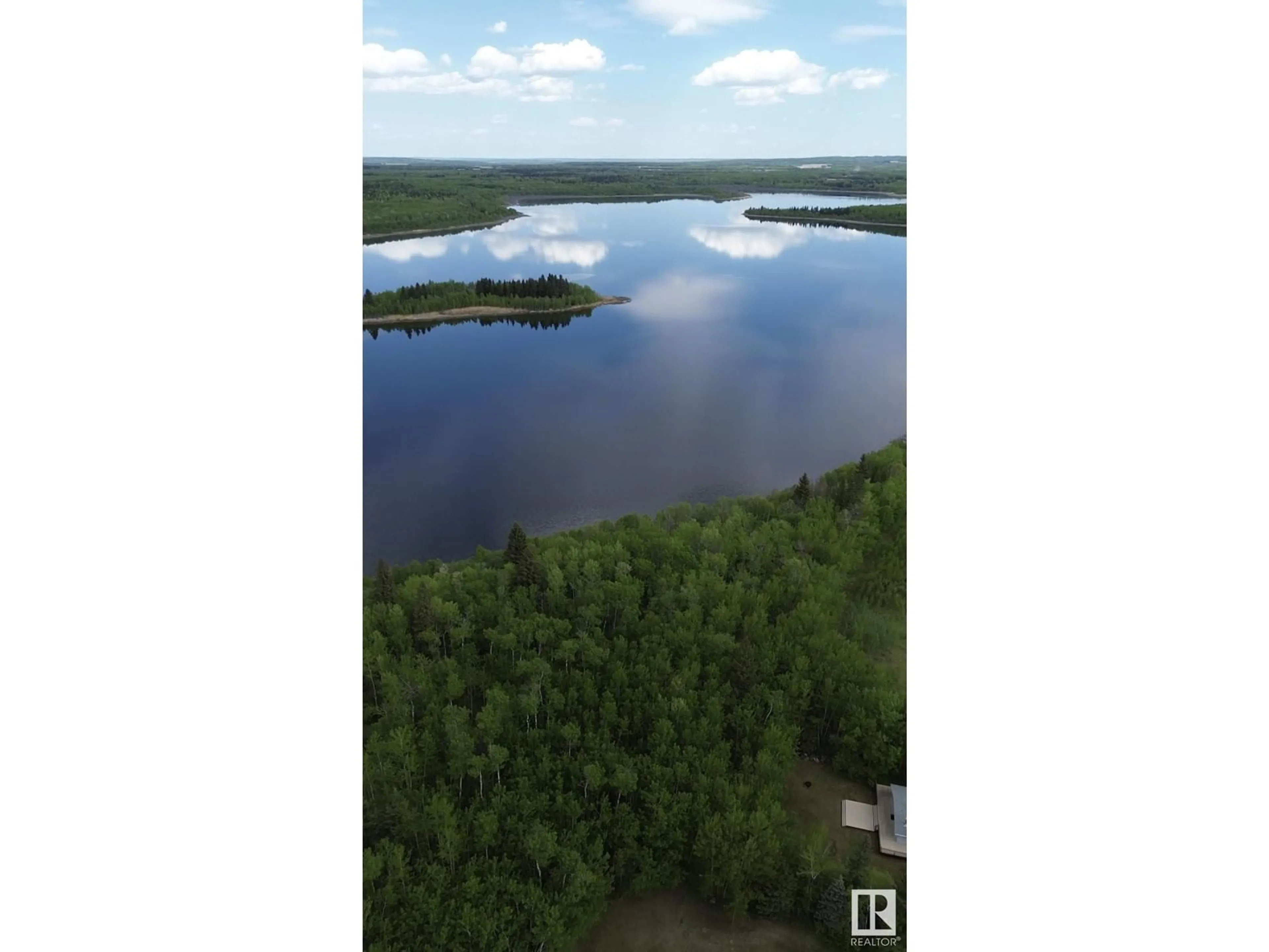 A pic from outside/outdoor area/front of a property/back of a property/a pic from drone, water/lake/river/ocean view for 375 PERCH CRES, Rural Smoky Lake County Alberta T0A3L0