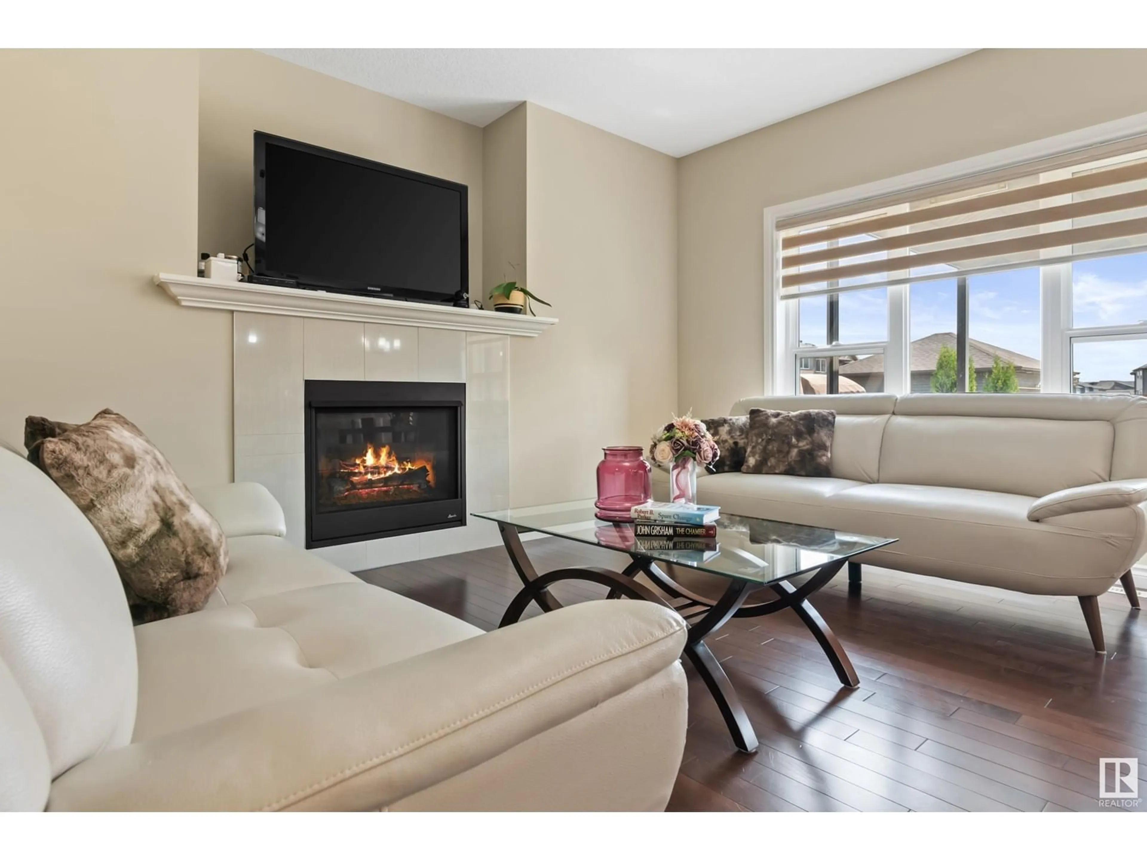 Living room with furniture, wood/laminate floor for 22513 94A AV, Edmonton Alberta T5T7B2