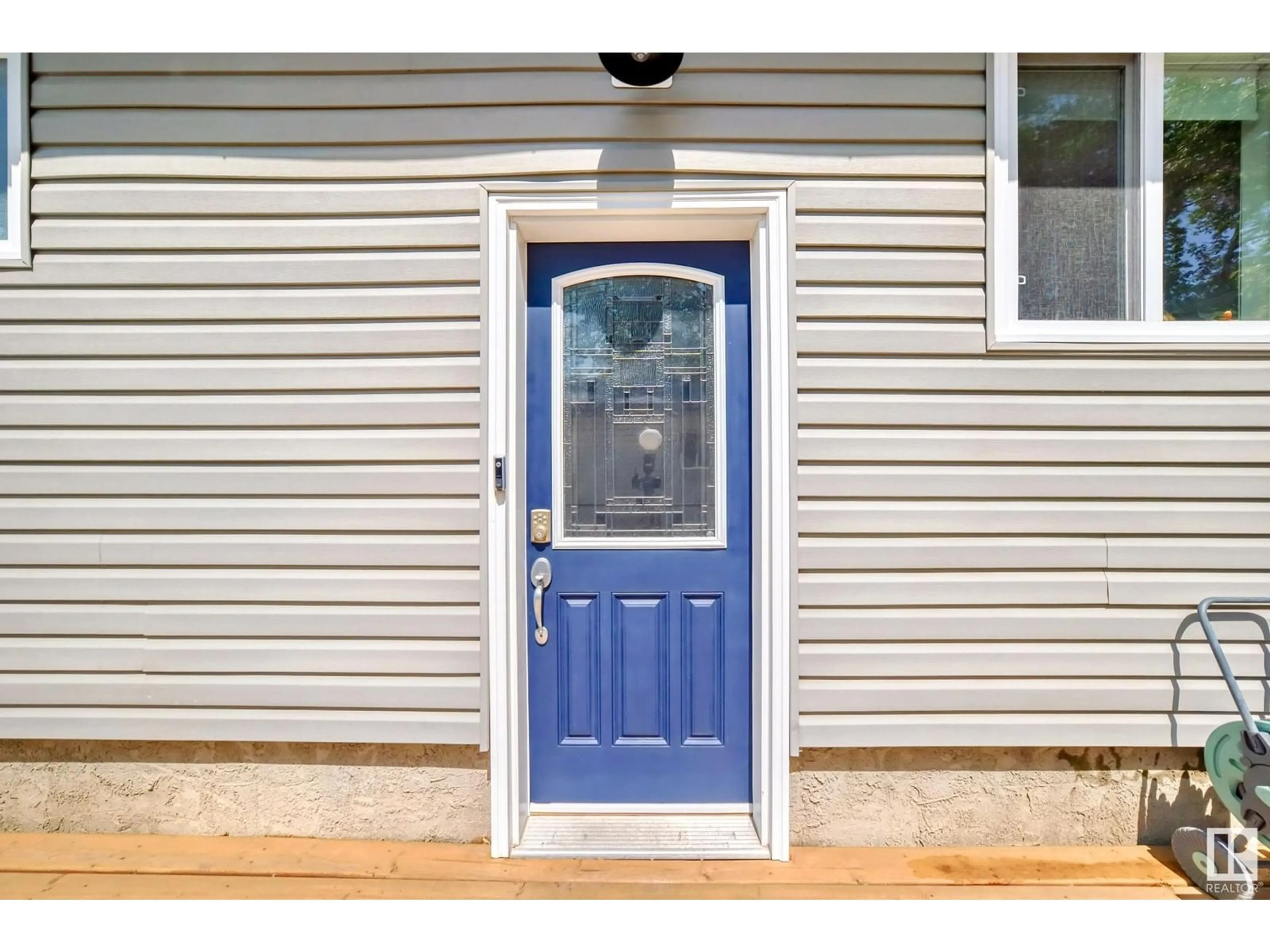 Home with vinyl exterior material, street for 12204 43 ST, Edmonton Alberta T5W2R3