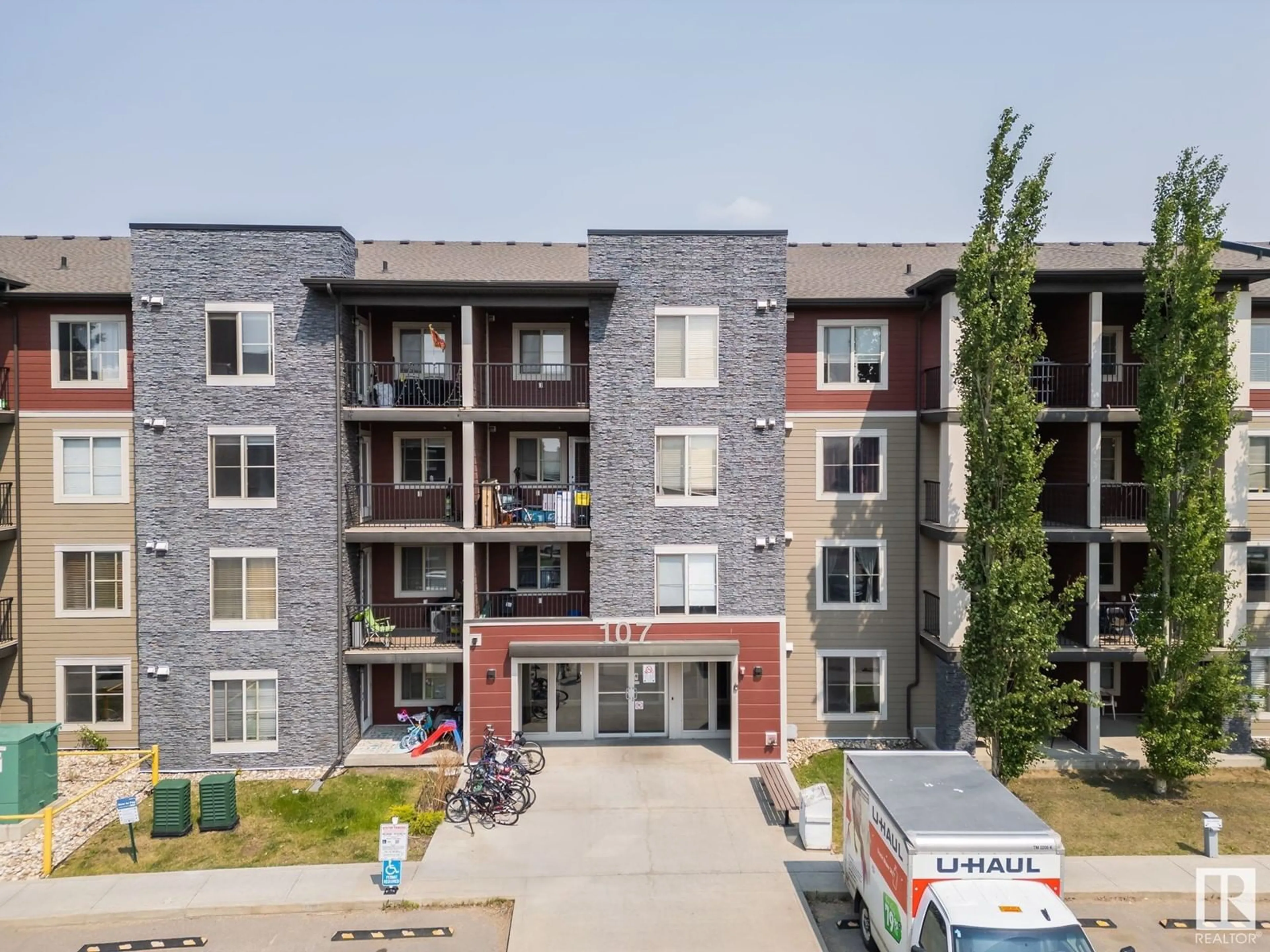 A pic from outside/outdoor area/front of a property/back of a property/a pic from drone, unknown for #208 - 107 WATT CM, Edmonton Alberta T6X2C6