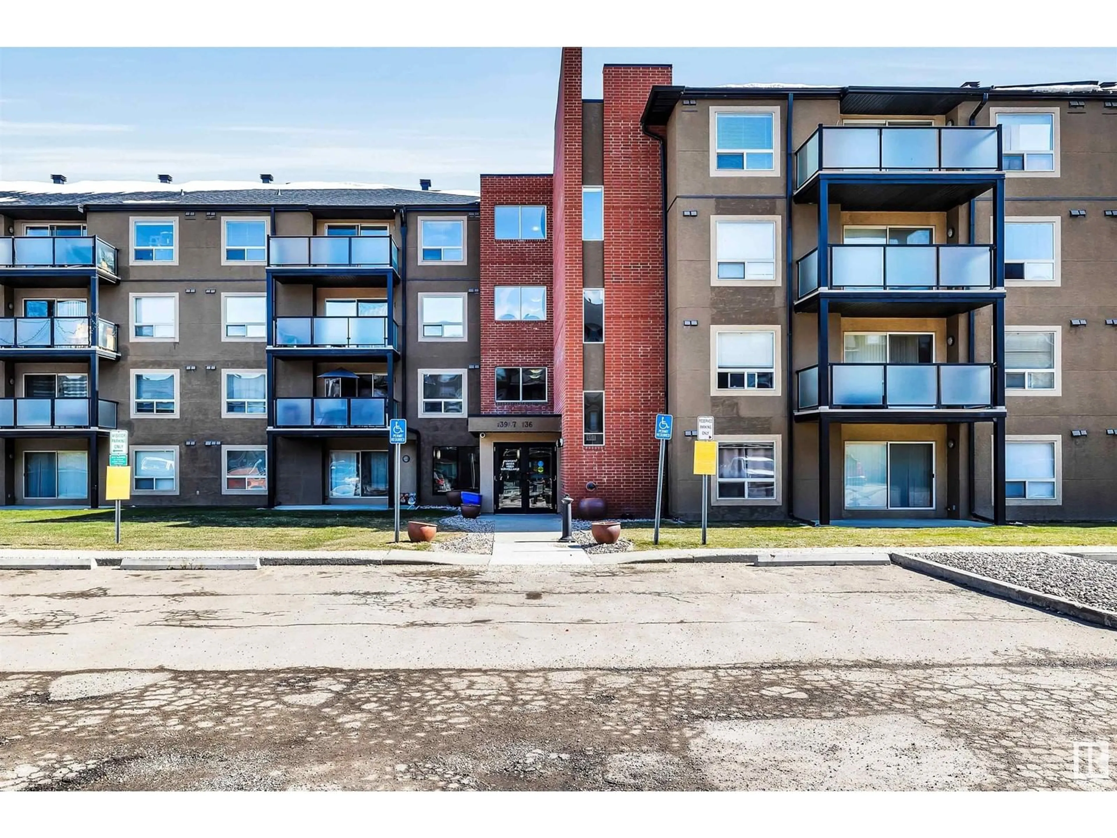 A pic from outside/outdoor area/front of a property/back of a property/a pic from drone, street for #302 - 13907 136 ST, Edmonton Alberta T6V1Y5