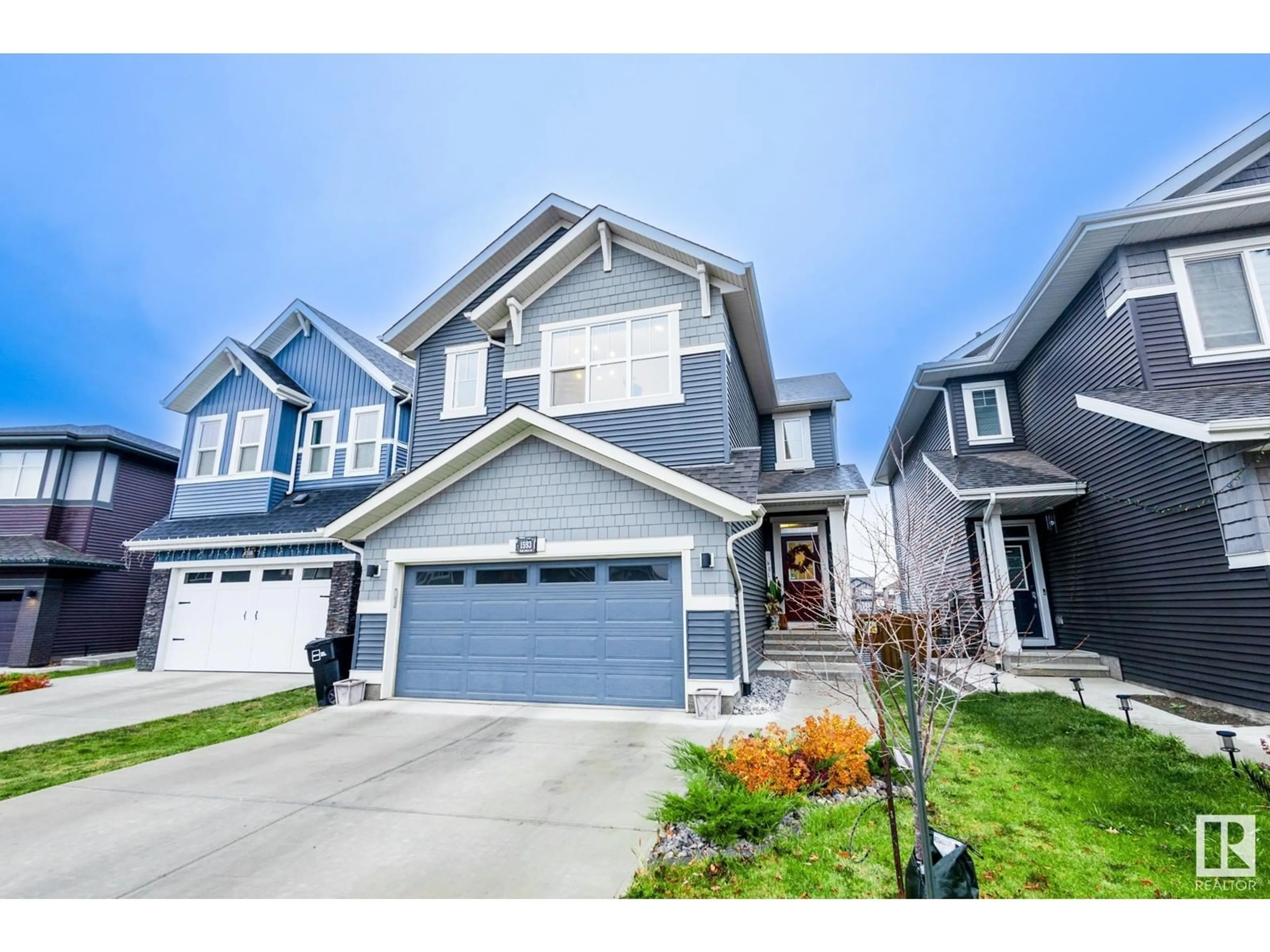 Home with vinyl exterior material, street for 1593 PLUM CIRCLE, Edmonton Alberta T6X2W9