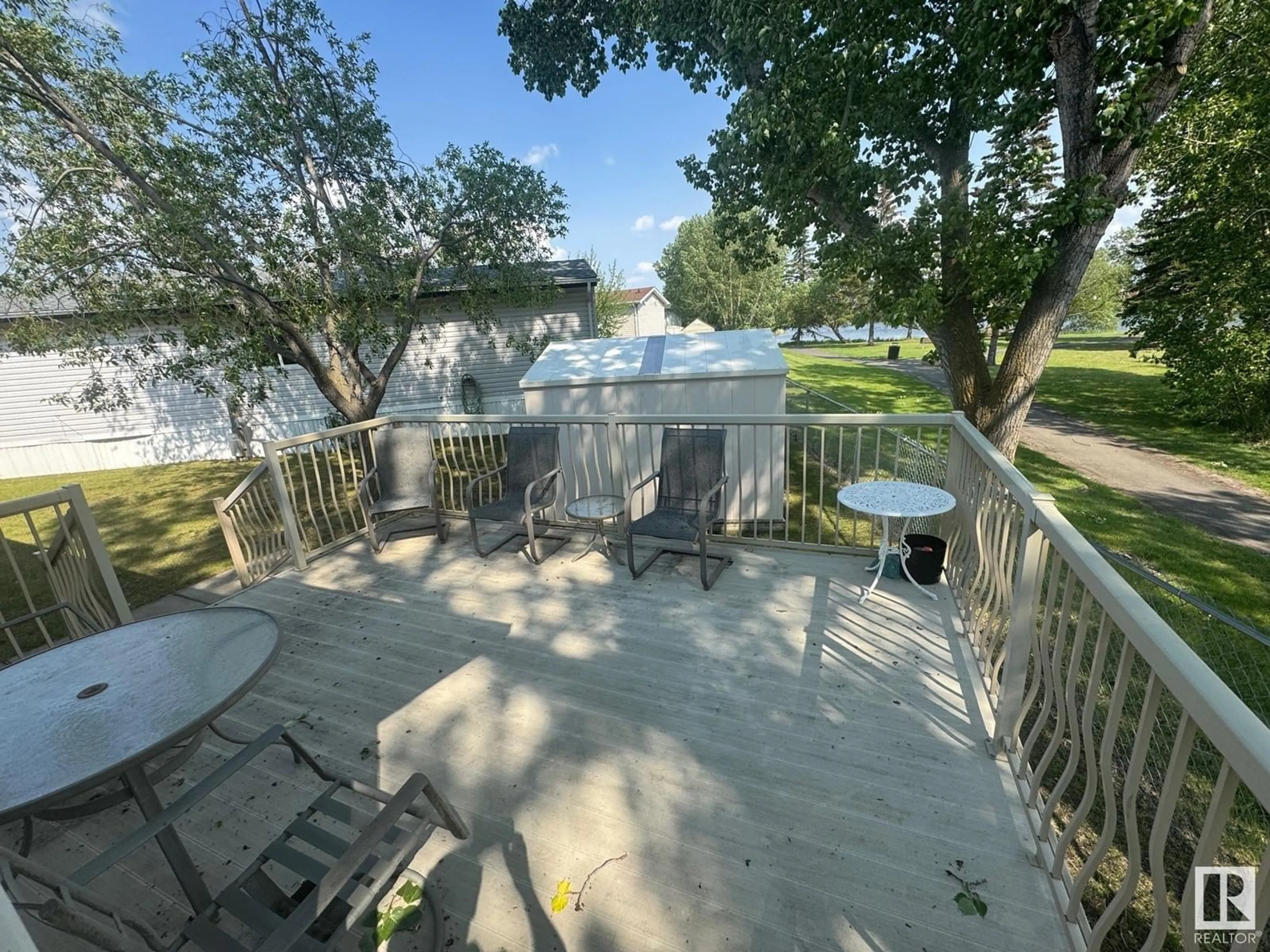 A pic from outside/outdoor area/front of a property/back of a property/a pic from drone, water/lake/river/ocean view for #1207 - 1207 RGE RD 275, Rural Parkland County Alberta T7X4K4