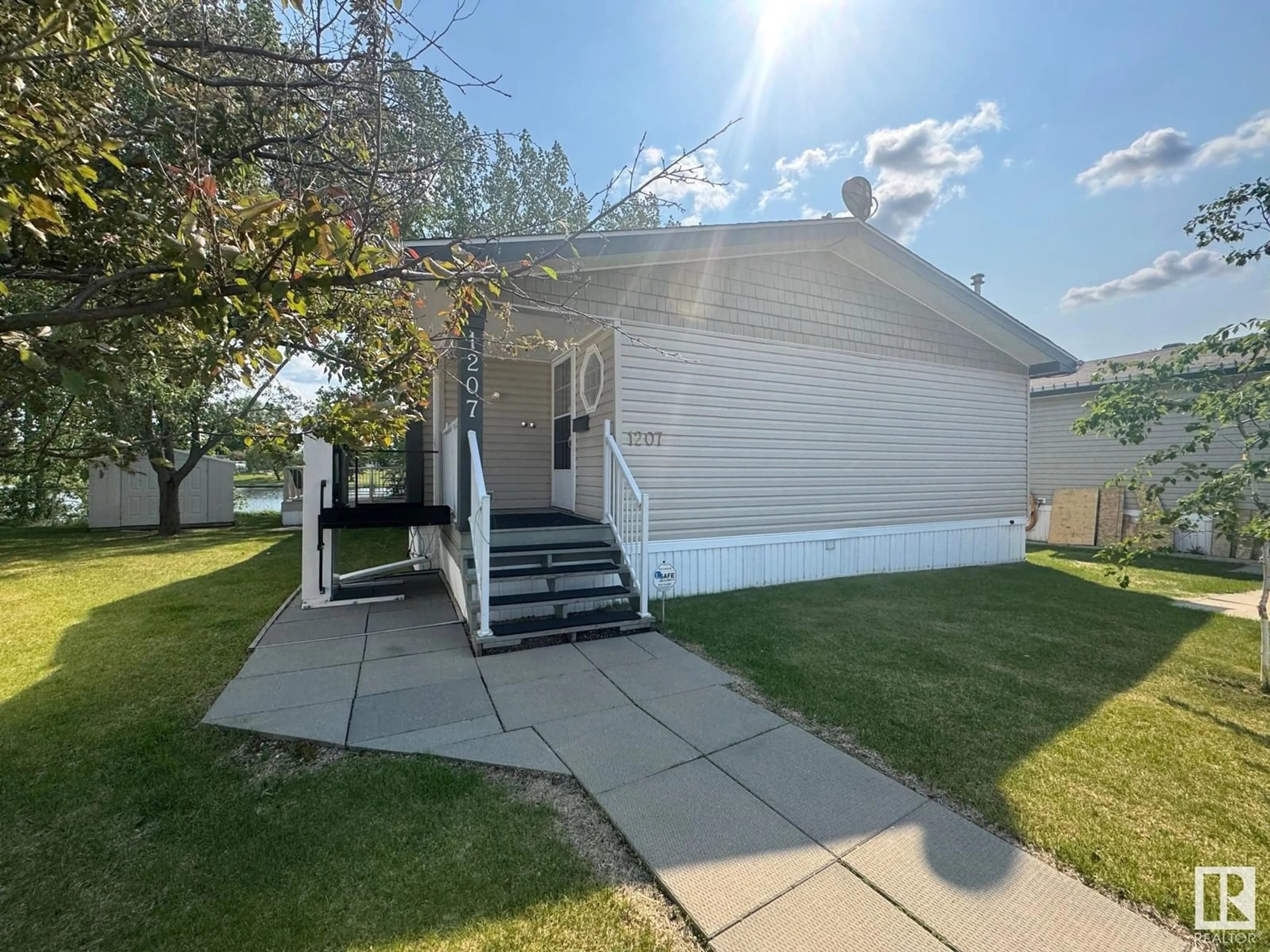 Home with vinyl exterior material, street for #1207 - 1207 RGE RD 275, Rural Parkland County Alberta T7X4K4