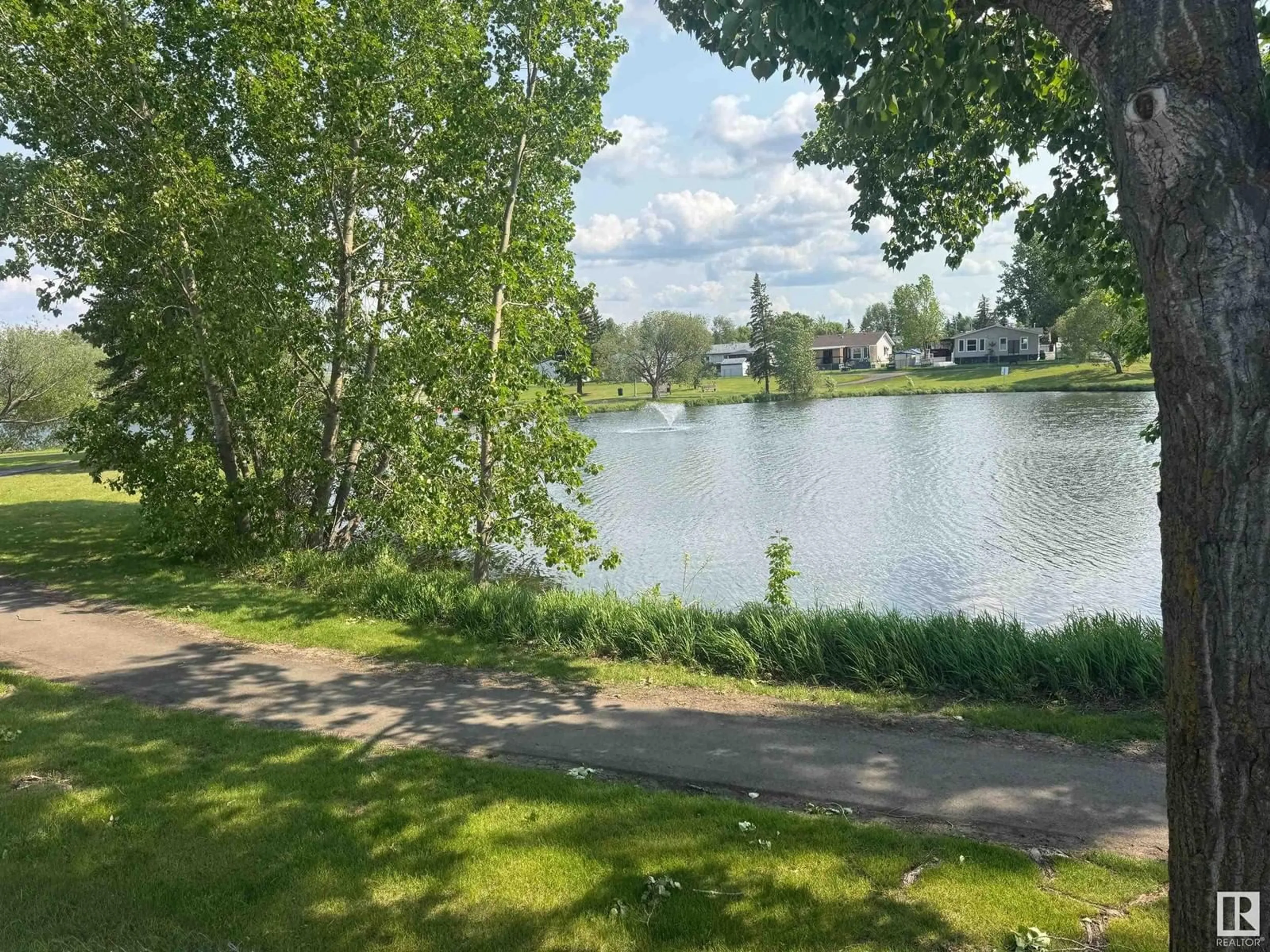 A pic from outside/outdoor area/front of a property/back of a property/a pic from drone, water/lake/river/ocean view for #1207 - 1207 RGE RD 275, Rural Parkland County Alberta T7X4K4