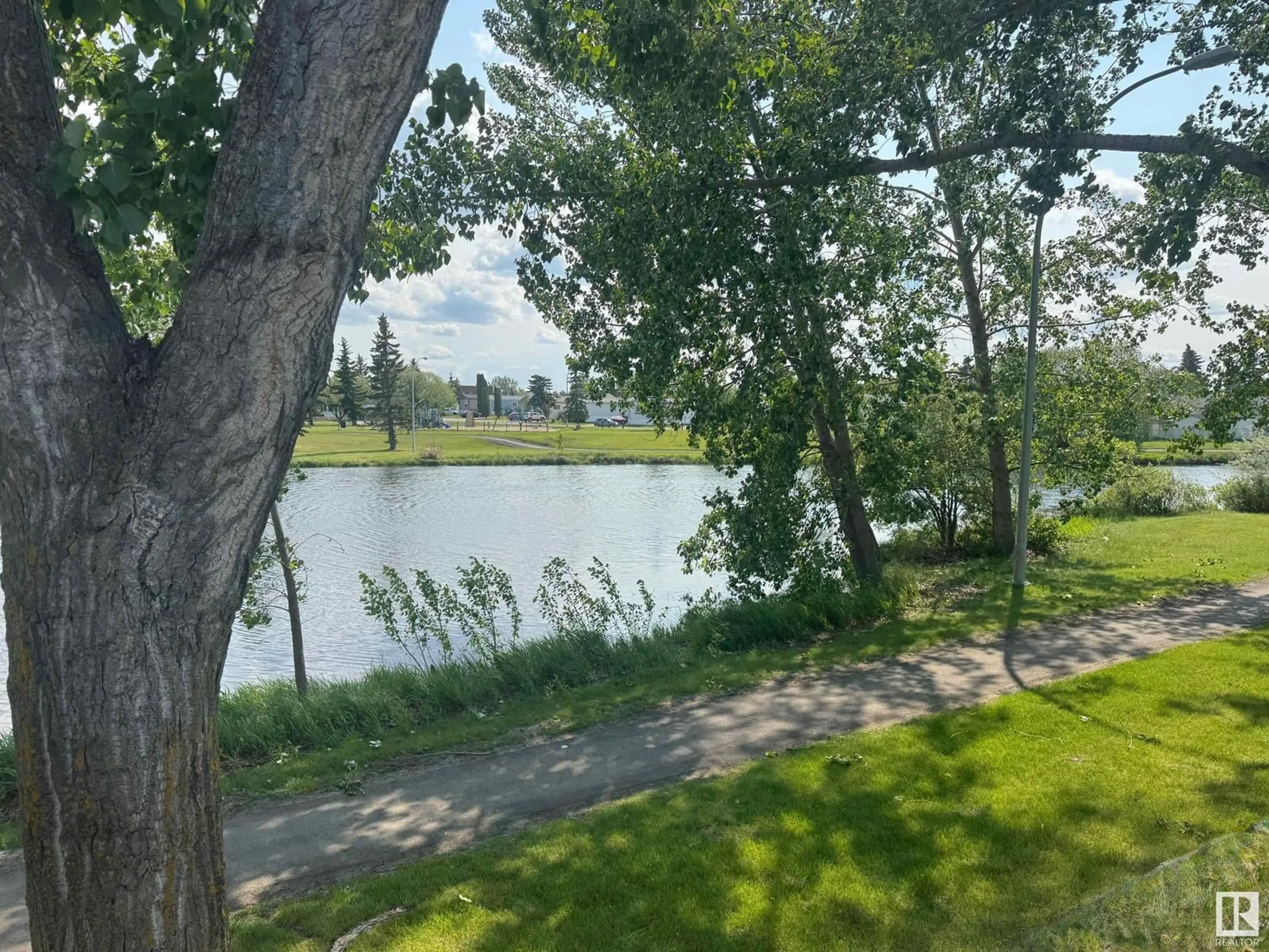 A pic from outside/outdoor area/front of a property/back of a property/a pic from drone, water/lake/river/ocean view for #1207 - 1207 RGE RD 275, Rural Parkland County Alberta T7X4K4
