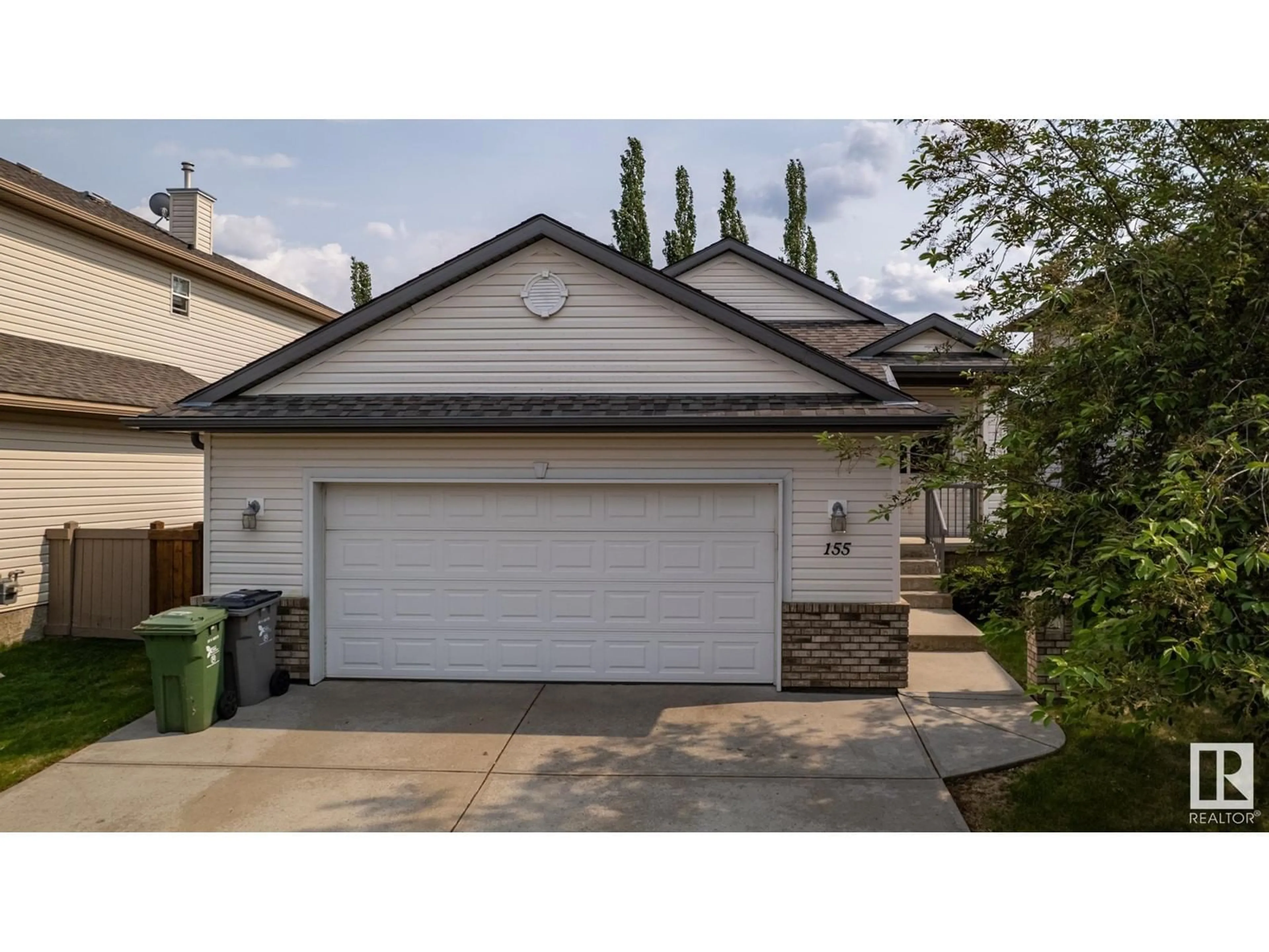 Home with vinyl exterior material, street for 155 REICHERT DR, Beaumont Alberta T4X0B8