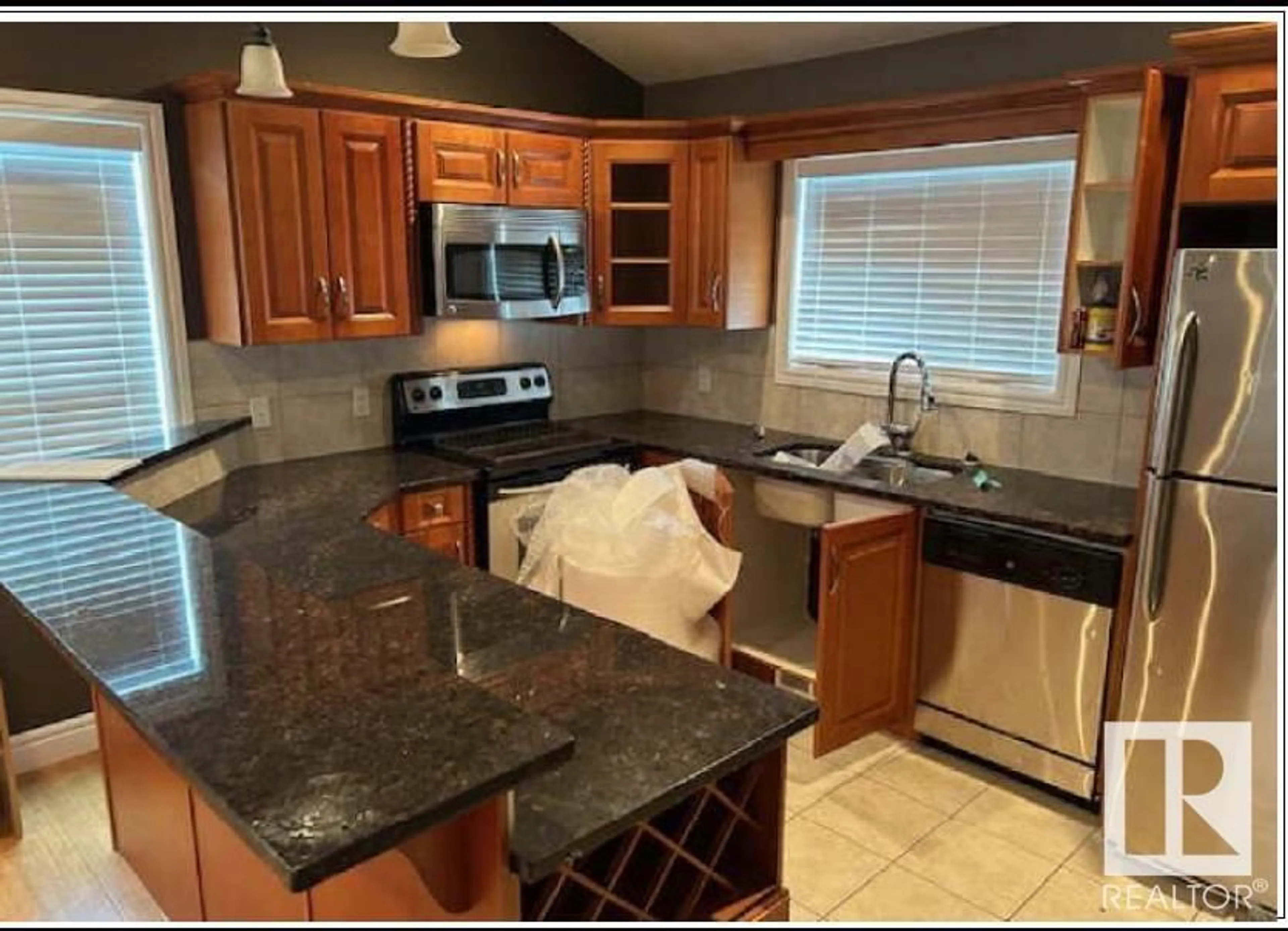 Open concept kitchen, ceramic/tile floor for #4025 - 25054 SOUTH PINE RD, Rural Red Deer County Alberta T0M1S0