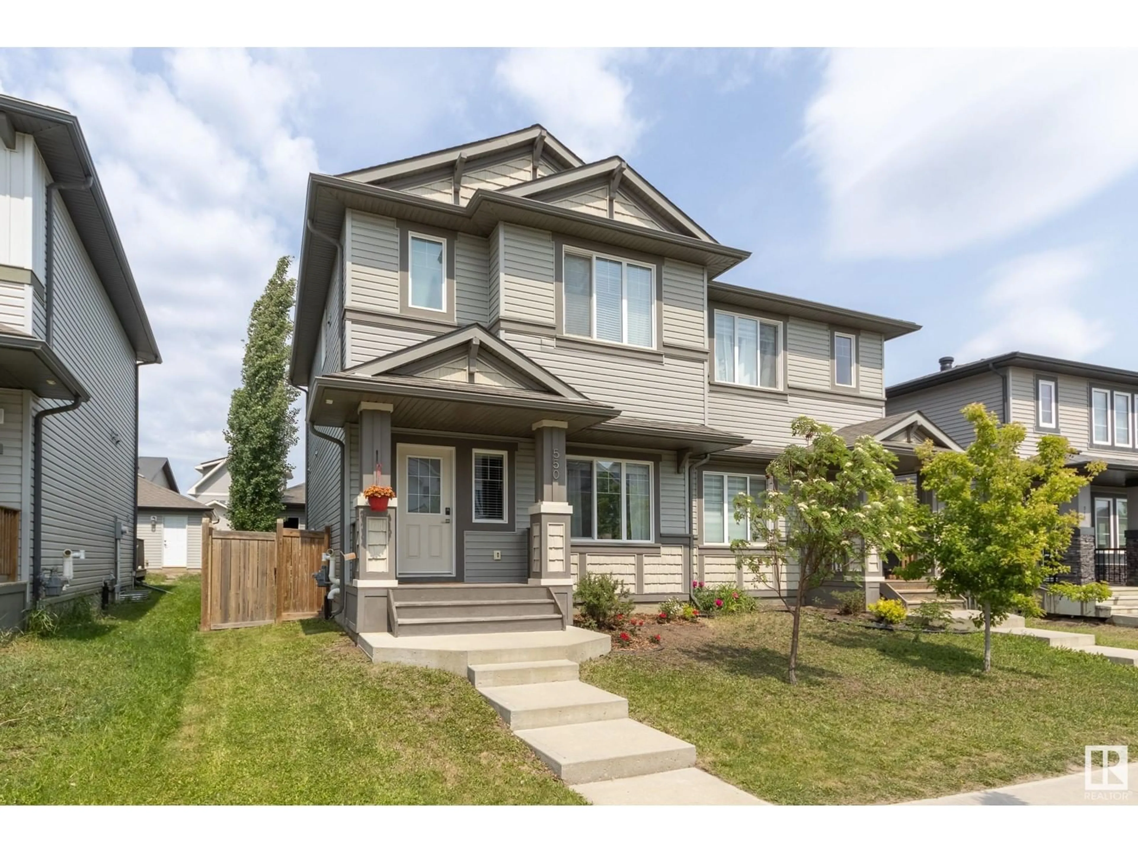 Home with vinyl exterior material, street for 550 SECORD BV, Edmonton Alberta T5T7B8