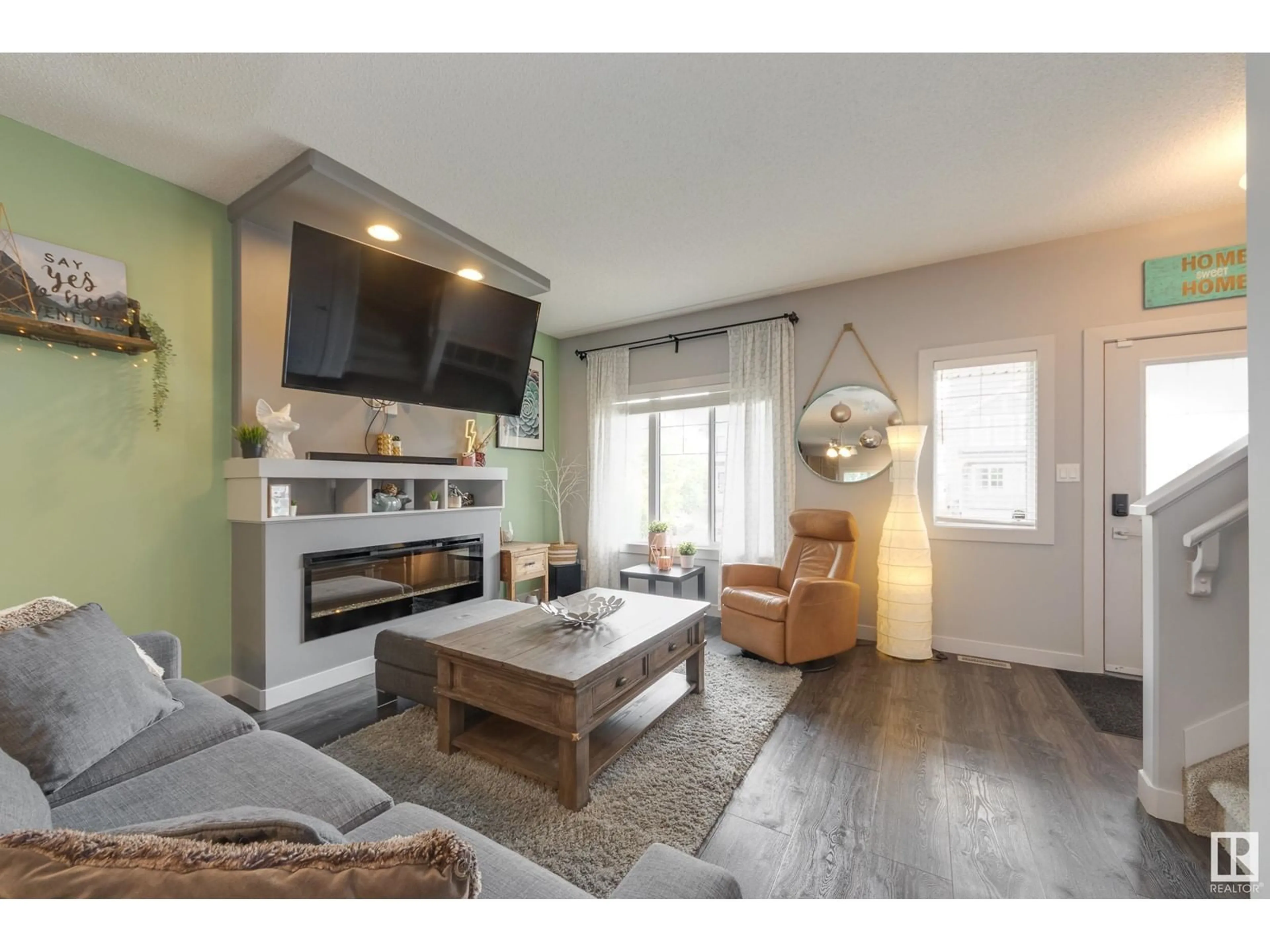 Living room with furniture, wood/laminate floor for 550 SECORD BV, Edmonton Alberta T5T7B8