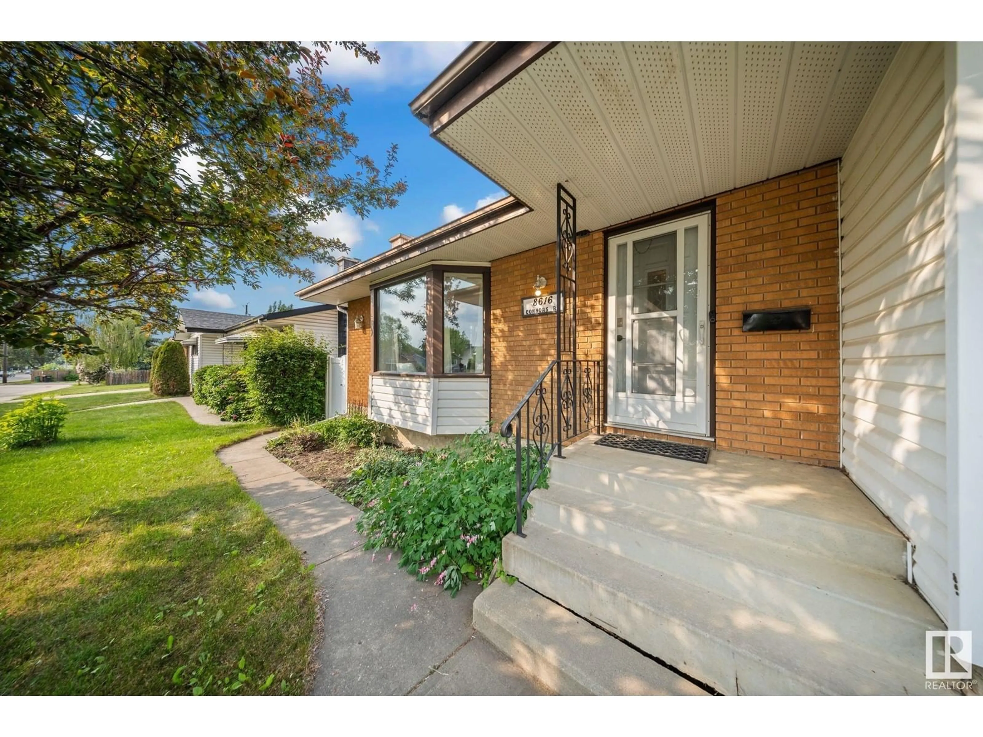 Home with brick exterior material, street for NW - 8616 CONNORS RD, Edmonton Alberta T6C4B4