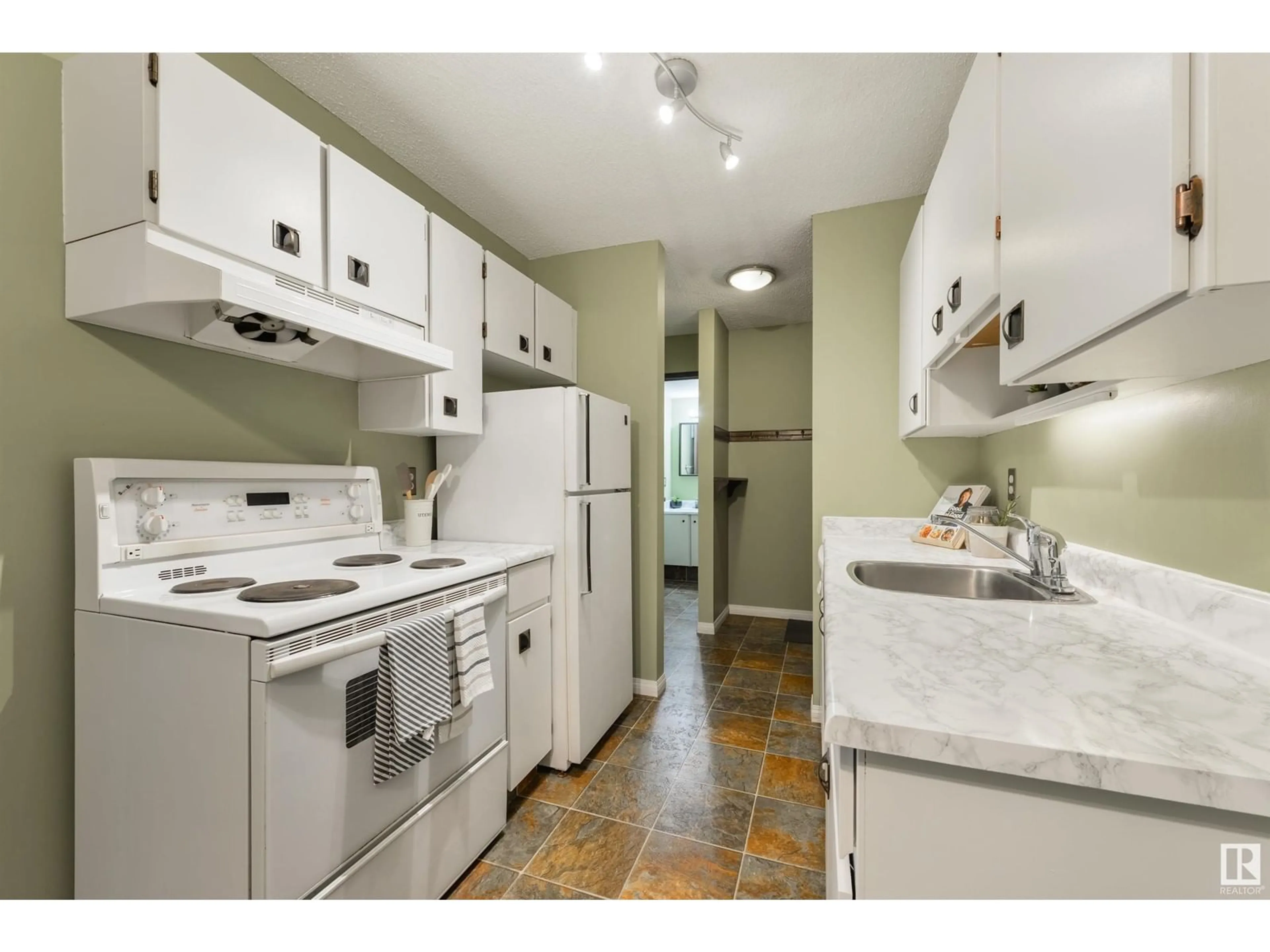 Standard kitchen, ceramic/tile floor for 10250 - 310 116 ST, Edmonton Alberta T5K1W4