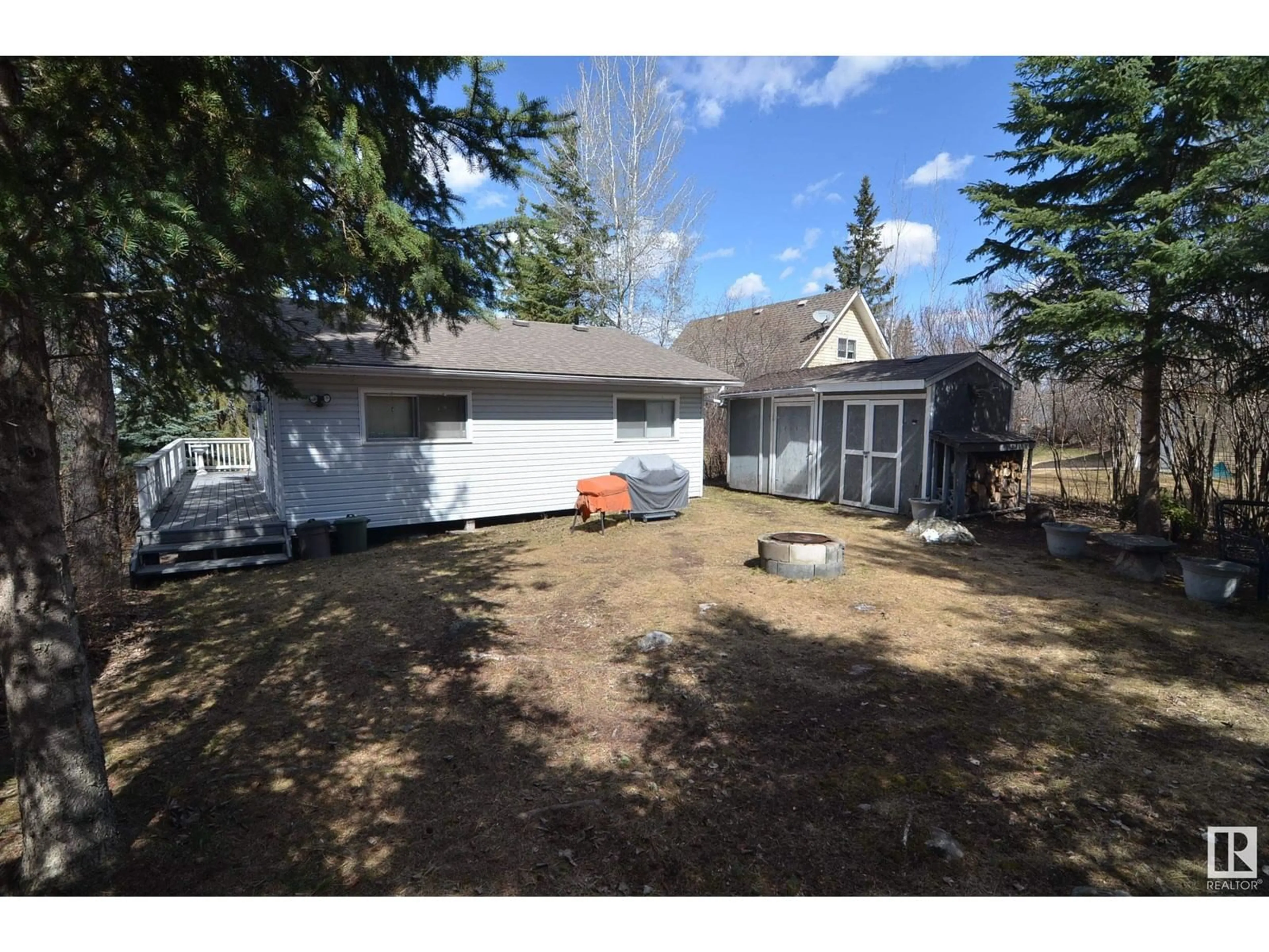 A pic from outside/outdoor area/front of a property/back of a property/a pic from drone, unknown for 110 - 5415 TWP RD 594, Rural Barrhead County Alberta T7N1N3