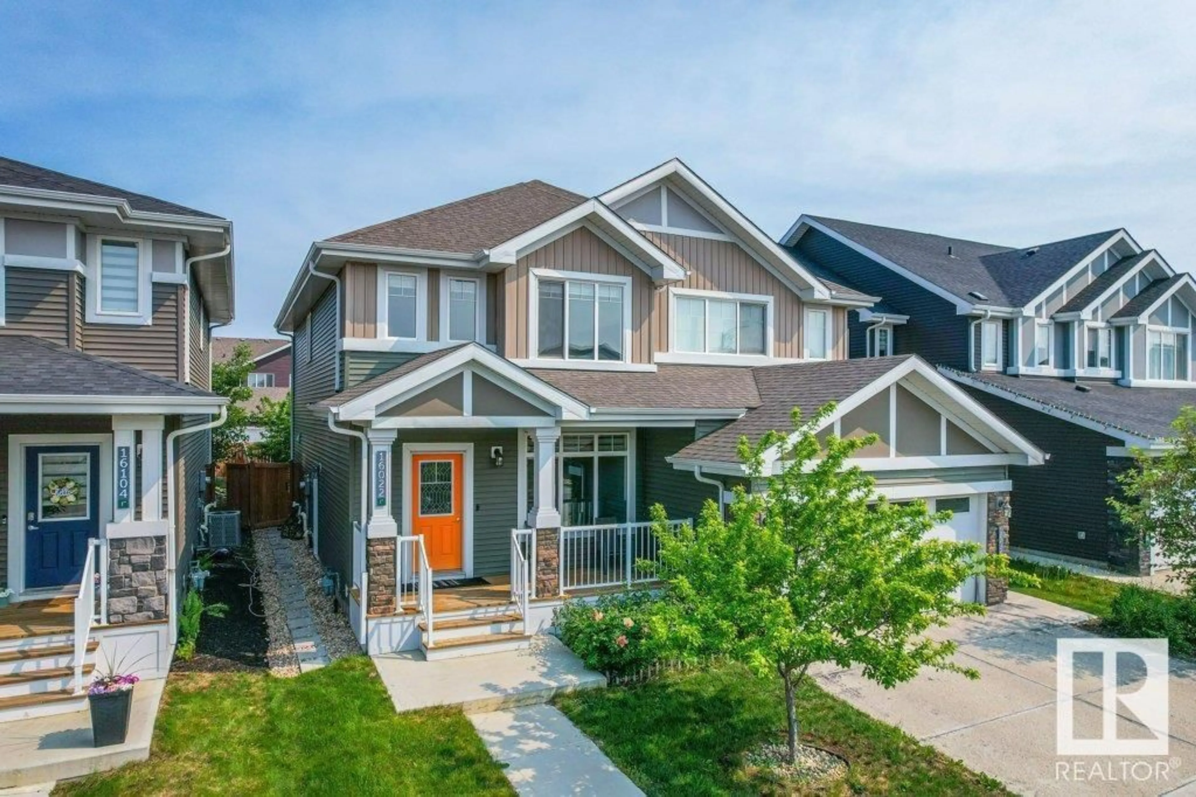 Home with vinyl exterior material, street for 16022 32 AV, Edmonton Alberta T6W4P3