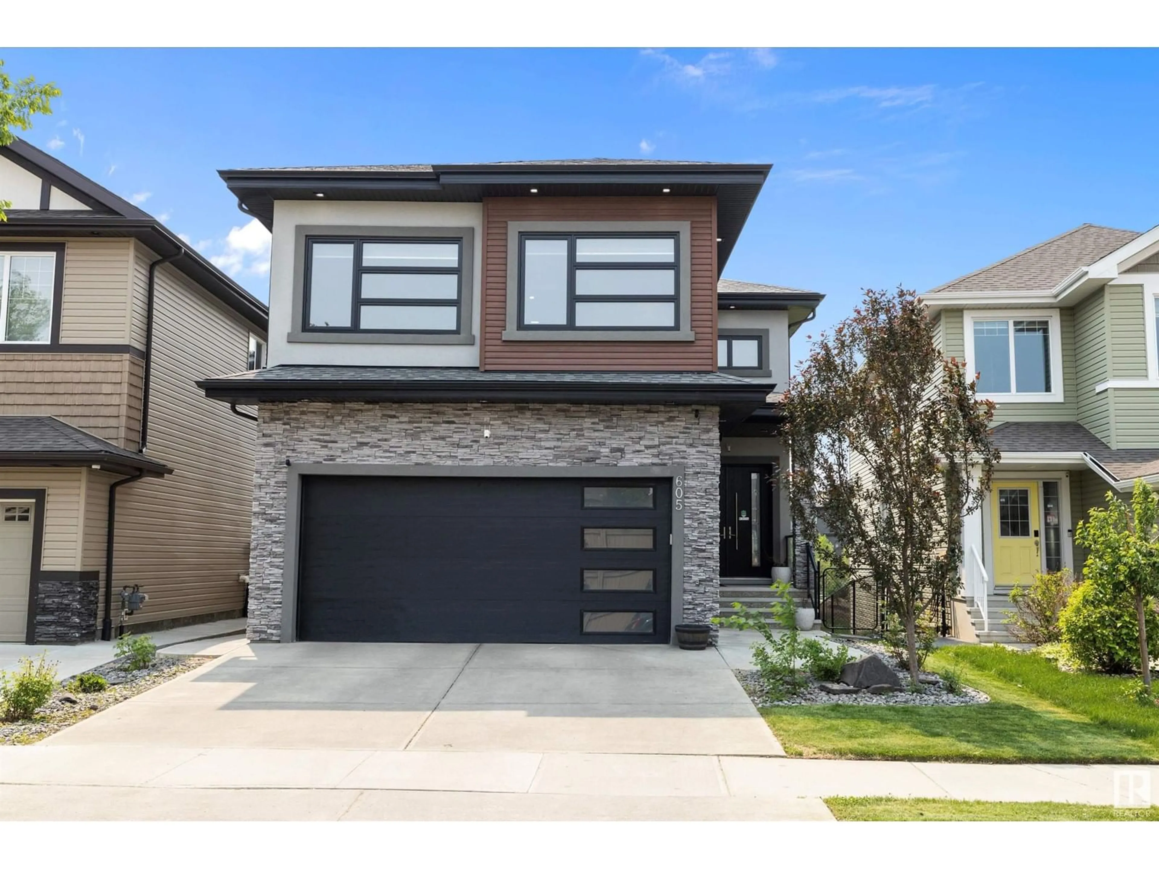 Home with brick exterior material, street for 605 HUDSON RD, Edmonton Alberta T6V0L5