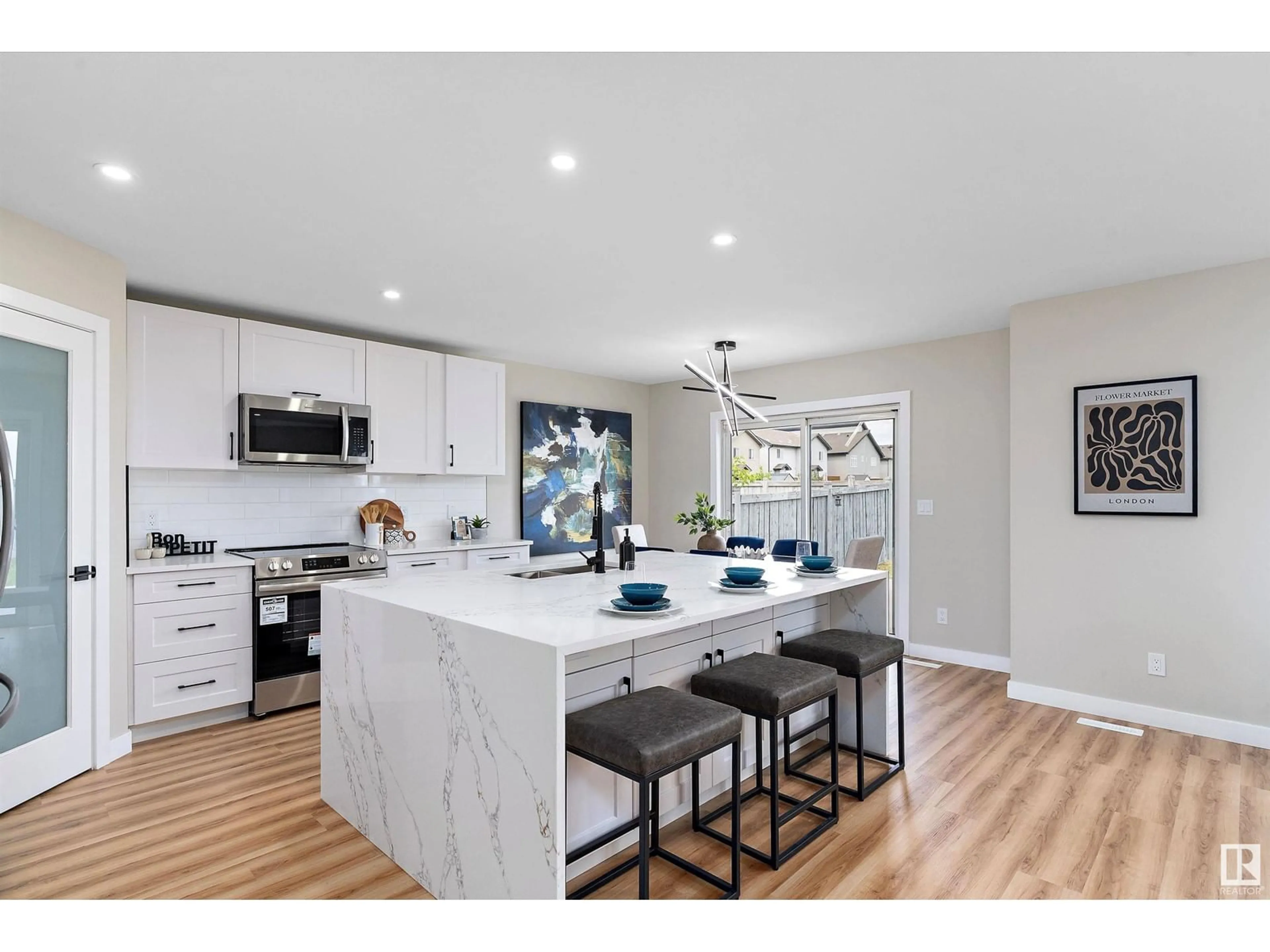 Open concept kitchen, ceramic/tile floor for NW - 11908 175 AV, Edmonton Alberta T5X0A5