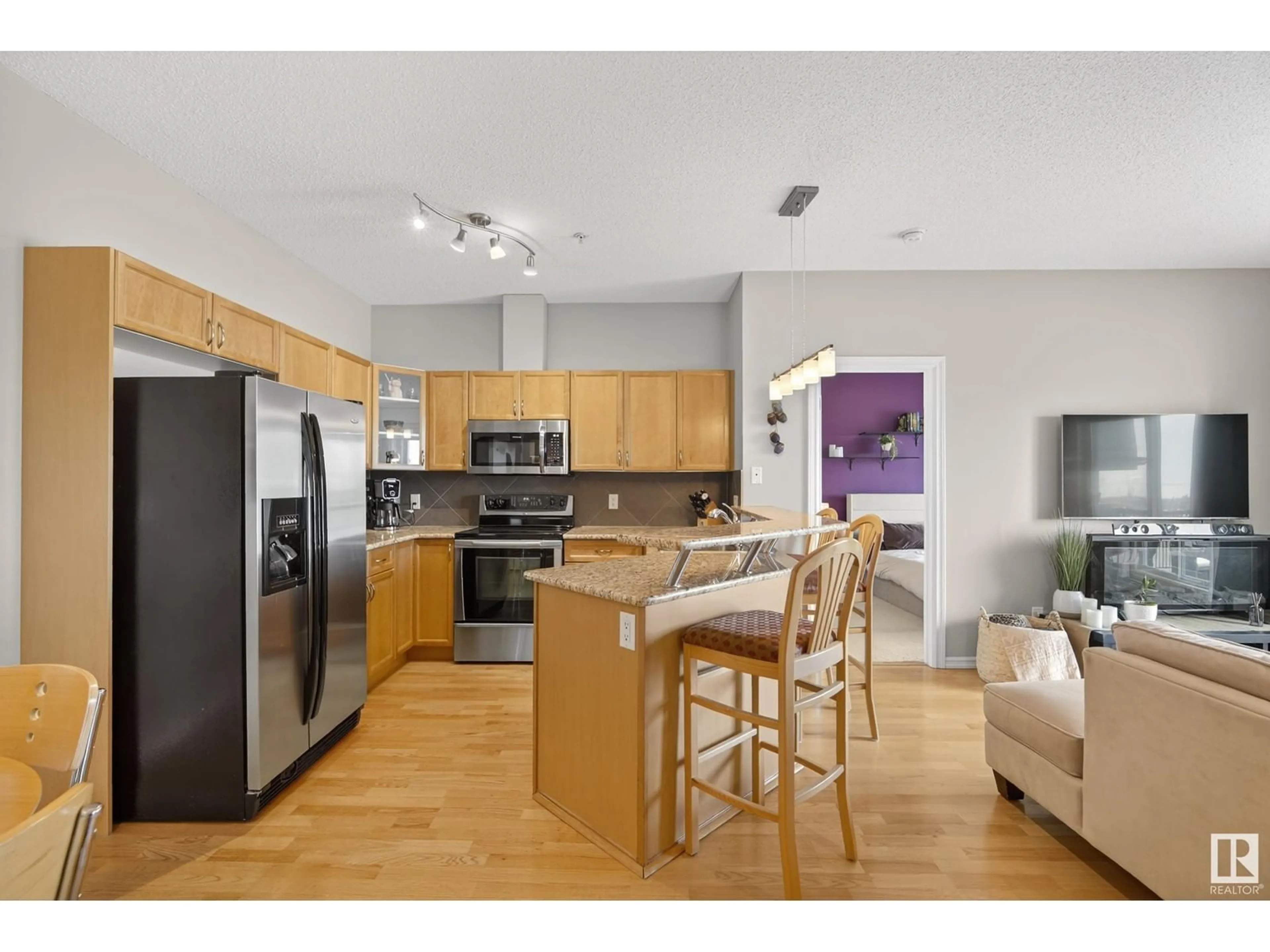 Open concept kitchen, unknown for 226 - 427 MACEWAN RD, Edmonton Alberta T6W0C5