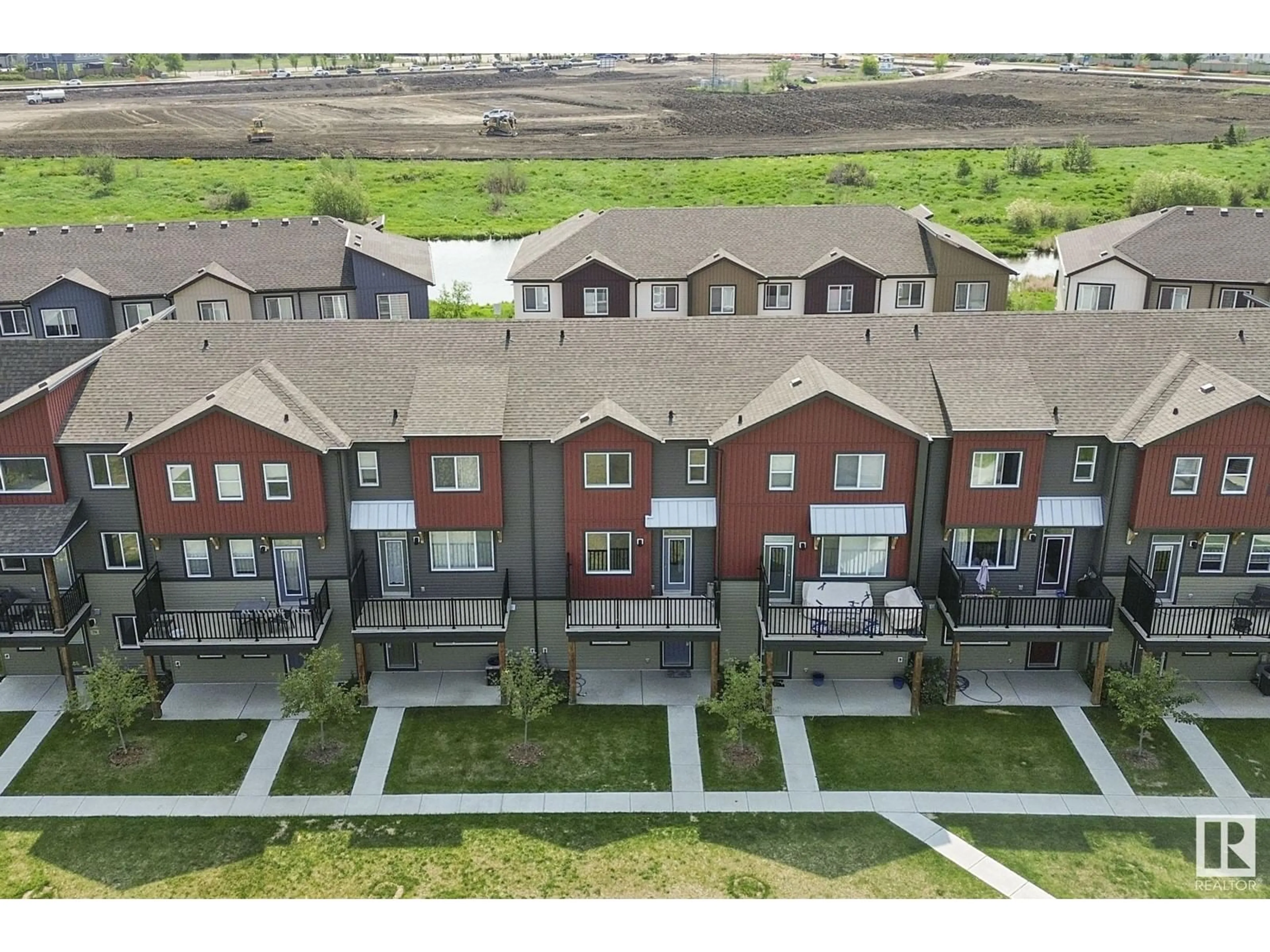 A pic from outside/outdoor area/front of a property/back of a property/a pic from drone, unknown for 82 16903 68ST NW, Edmonton Alberta T5Z0R1