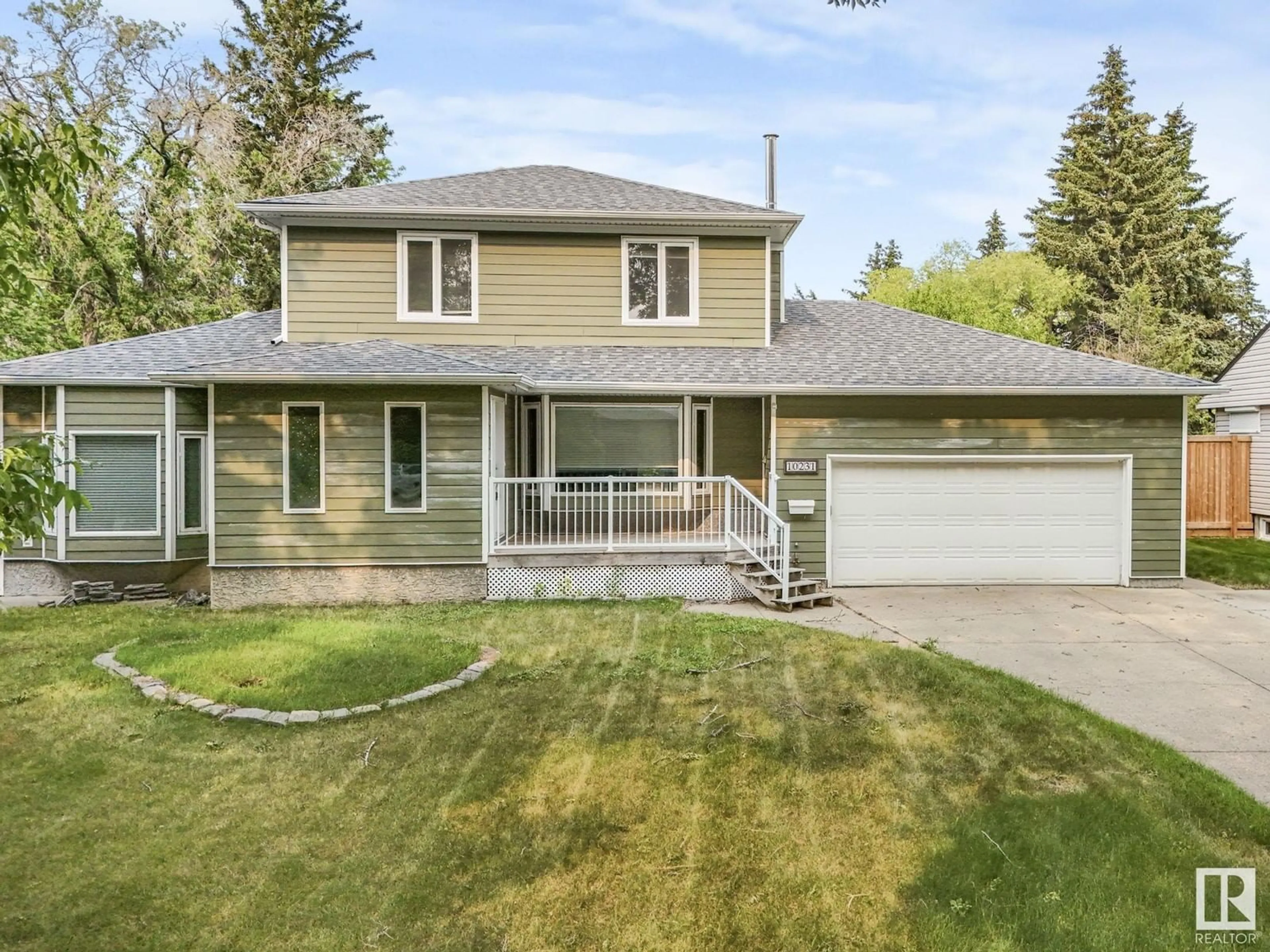 Home with vinyl exterior material, street for 10231 109 ST, Fort Saskatchewan Alberta T8L2K7