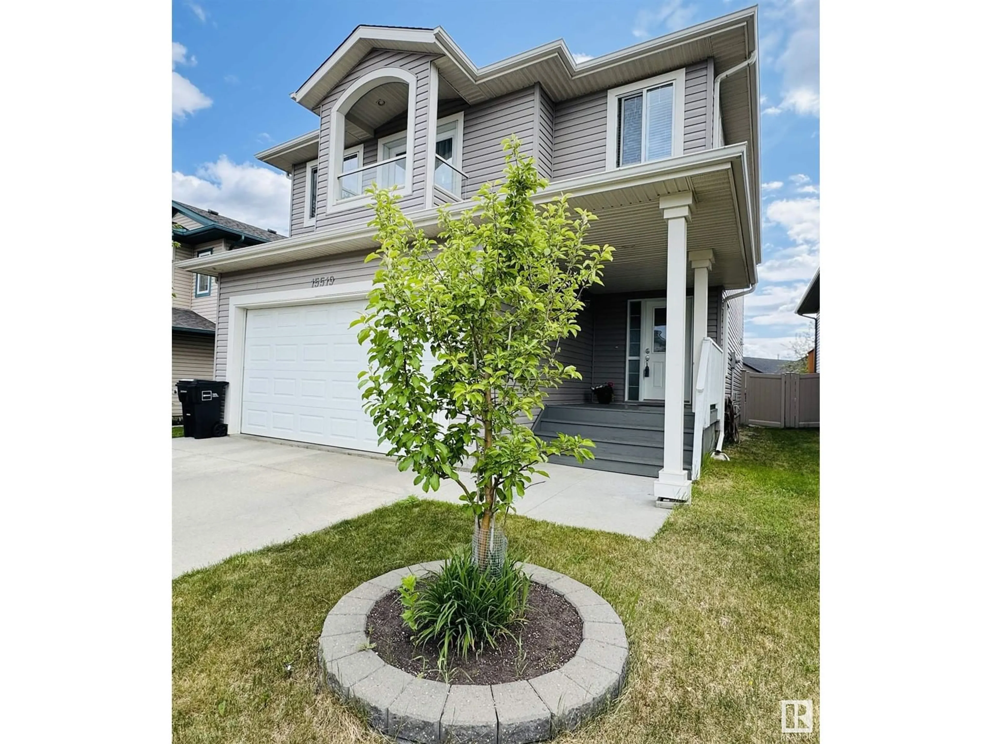 Home with vinyl exterior material, street for 15519 47 ST, Edmonton Alberta T5Y3L8