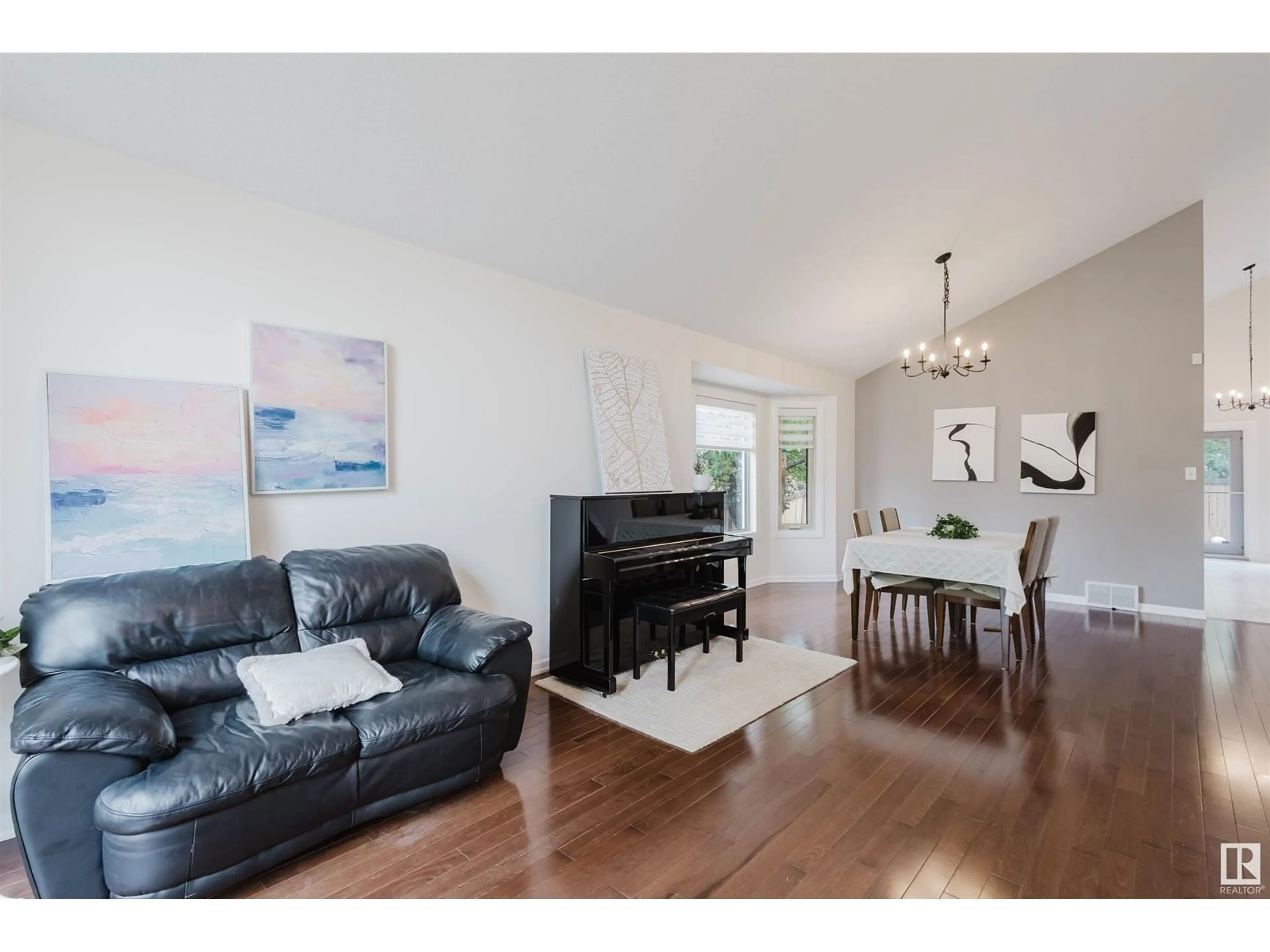 Living room with furniture, wood/laminate floor for 333 BURTON RD, Edmonton Alberta T6R2G7