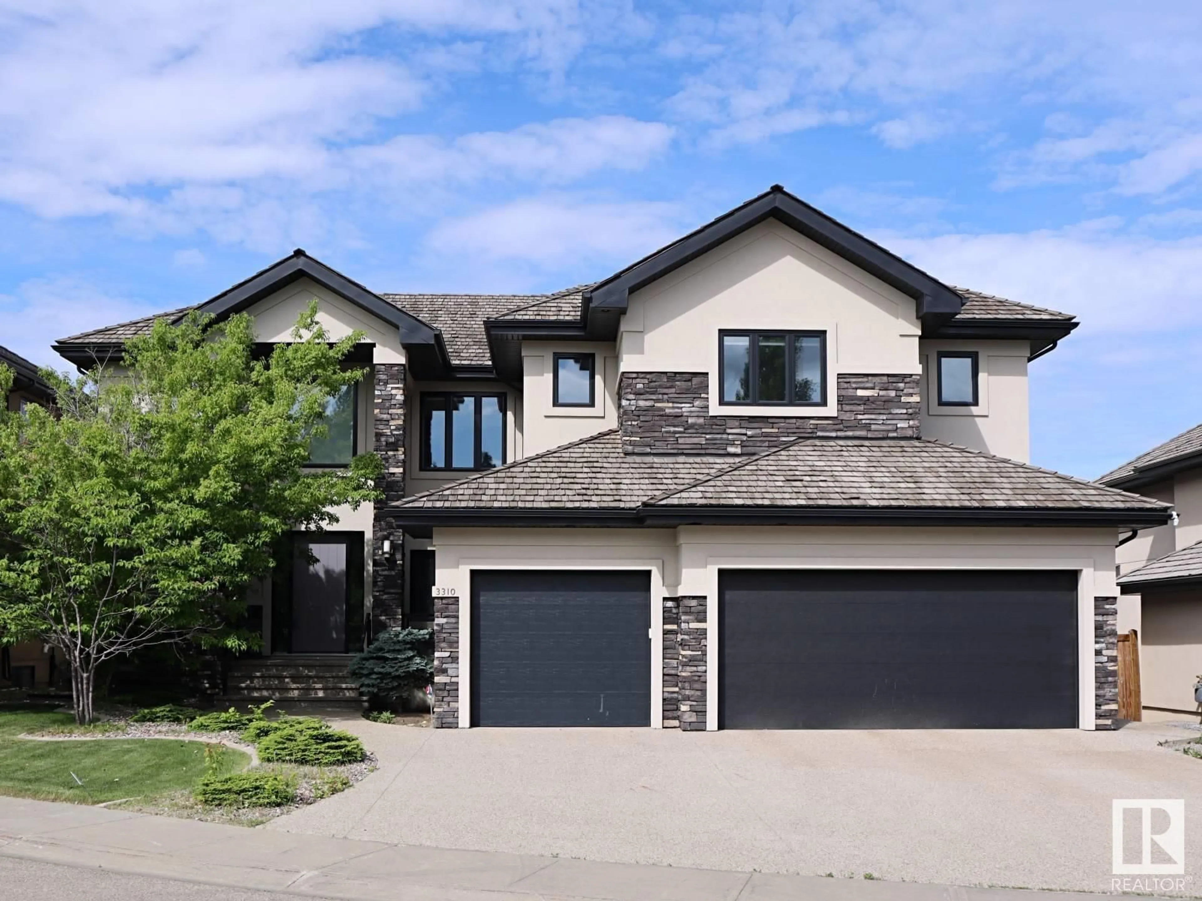 Home with vinyl exterior material, street for 3310 WATSON BA, Edmonton Alberta T6W0P2