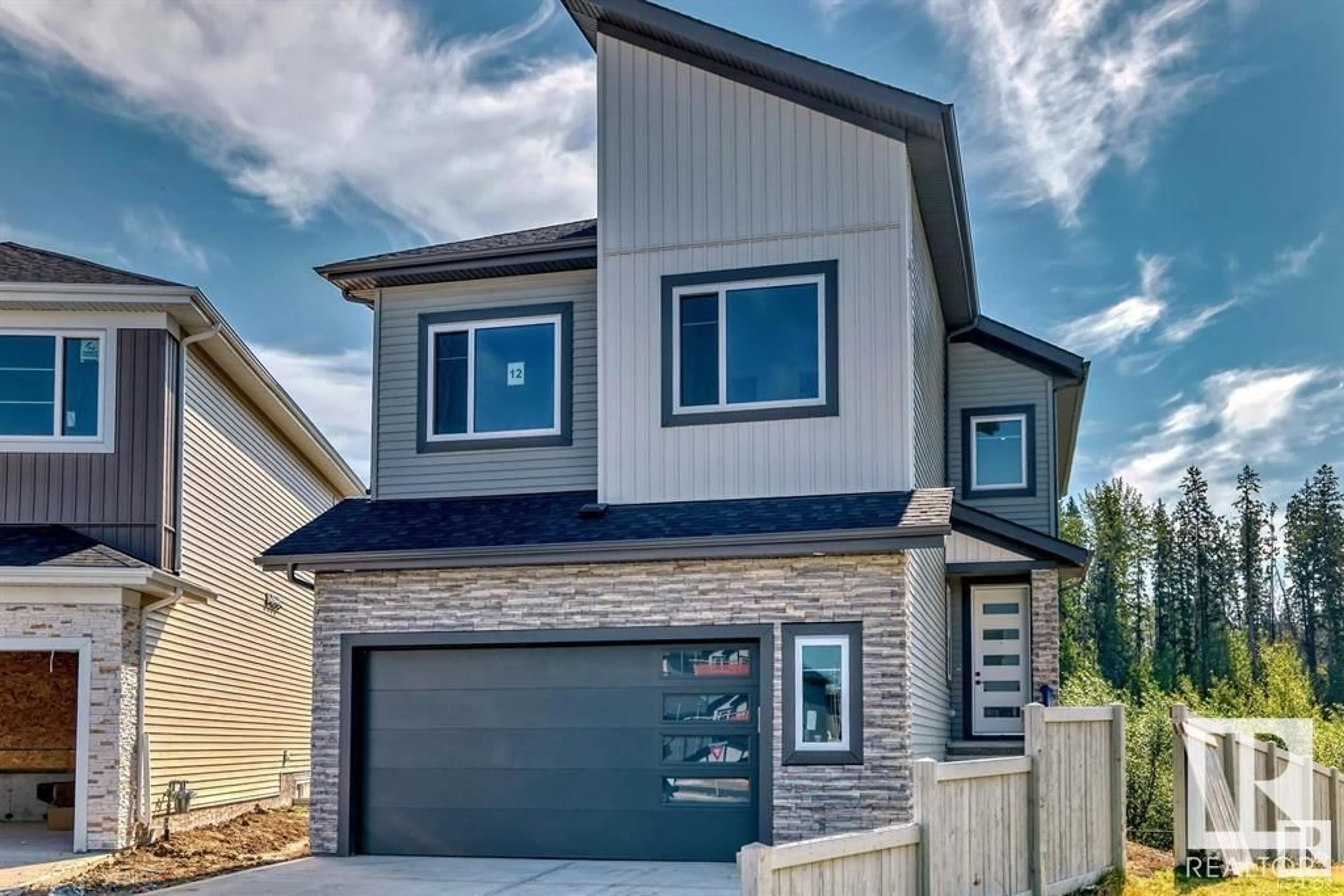 Home with vinyl exterior material, street for 19 TRILL POINT, Spruce Grove Alberta T7X4E2