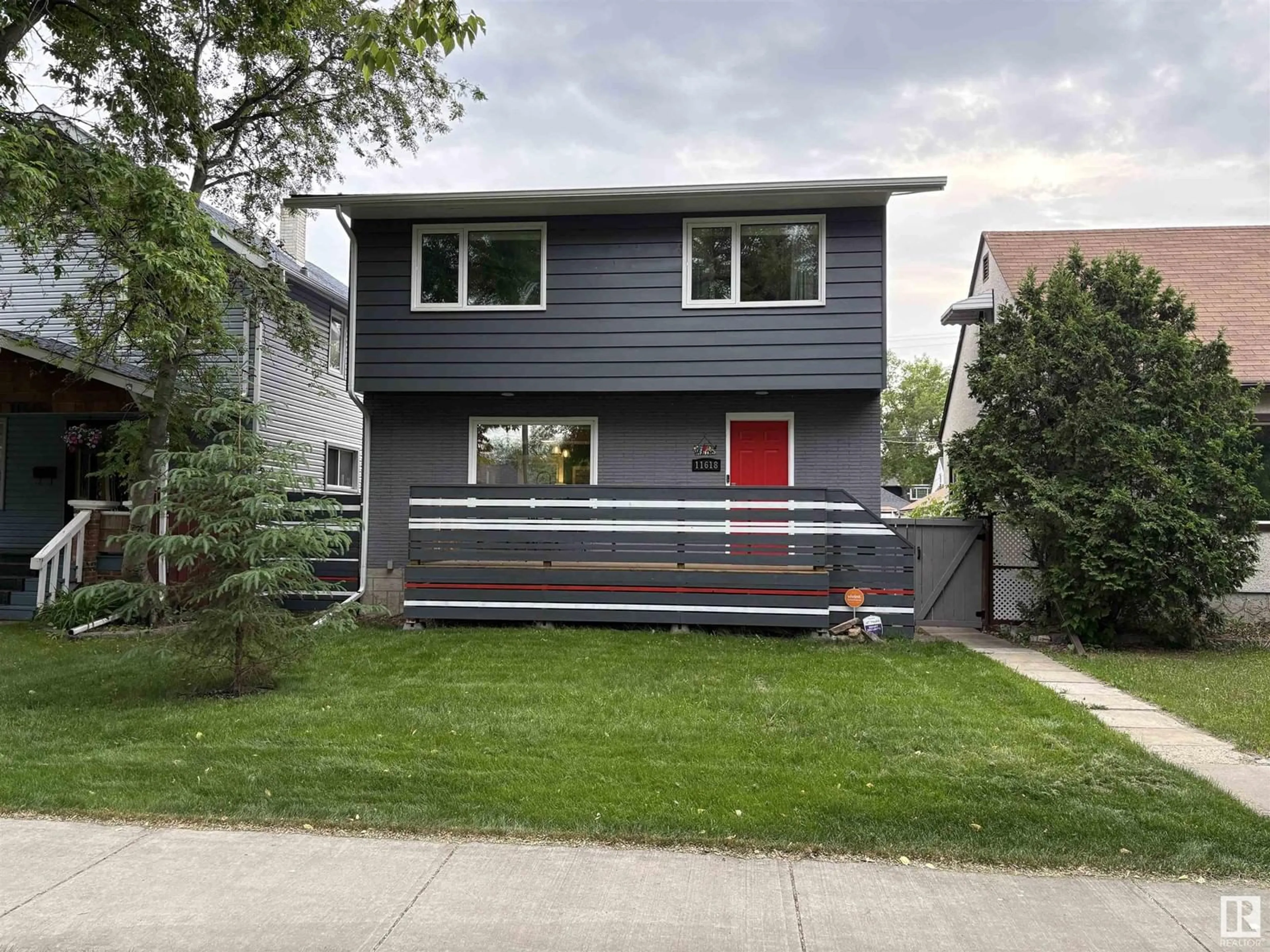Home with vinyl exterior material, street for 11618 88 ST, Edmonton Alberta T5B3R4