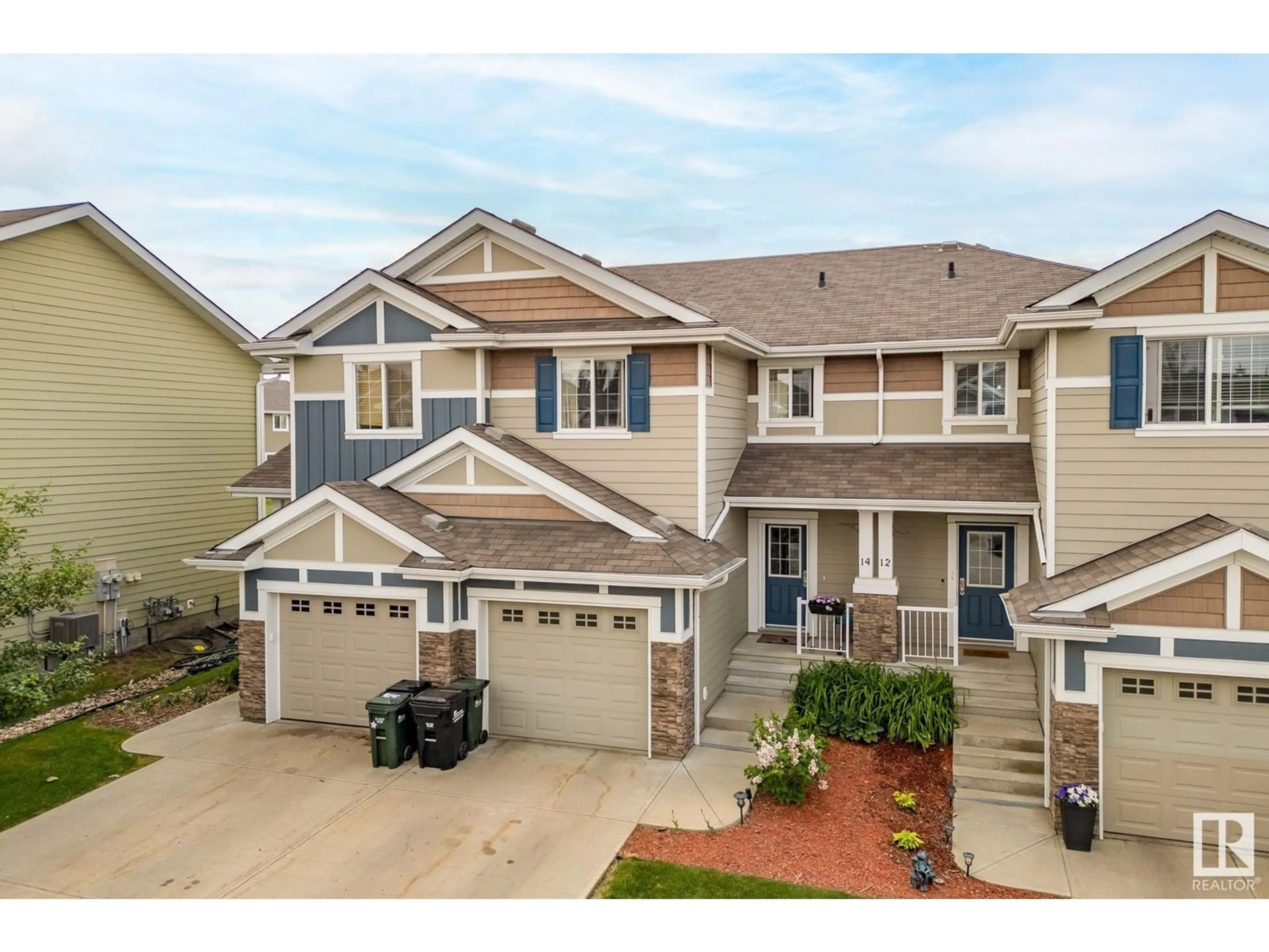 A pic from outside/outdoor area/front of a property/back of a property/a pic from drone, street for 14 - 219 CHARLOTTE WY, Sherwood Park Alberta T8H0T3