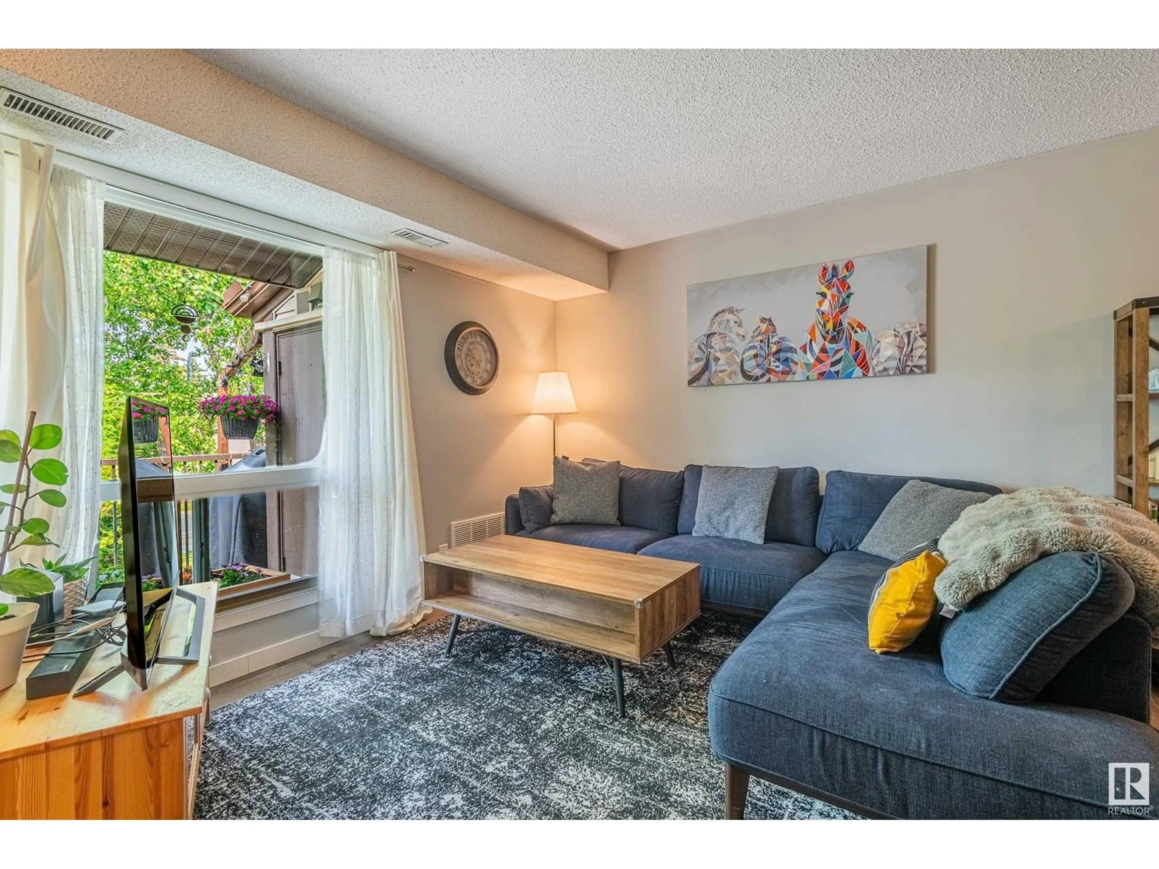 Living room with furniture, unknown for 2003 SADDLEBACK RD, Edmonton Alberta T5J4T4