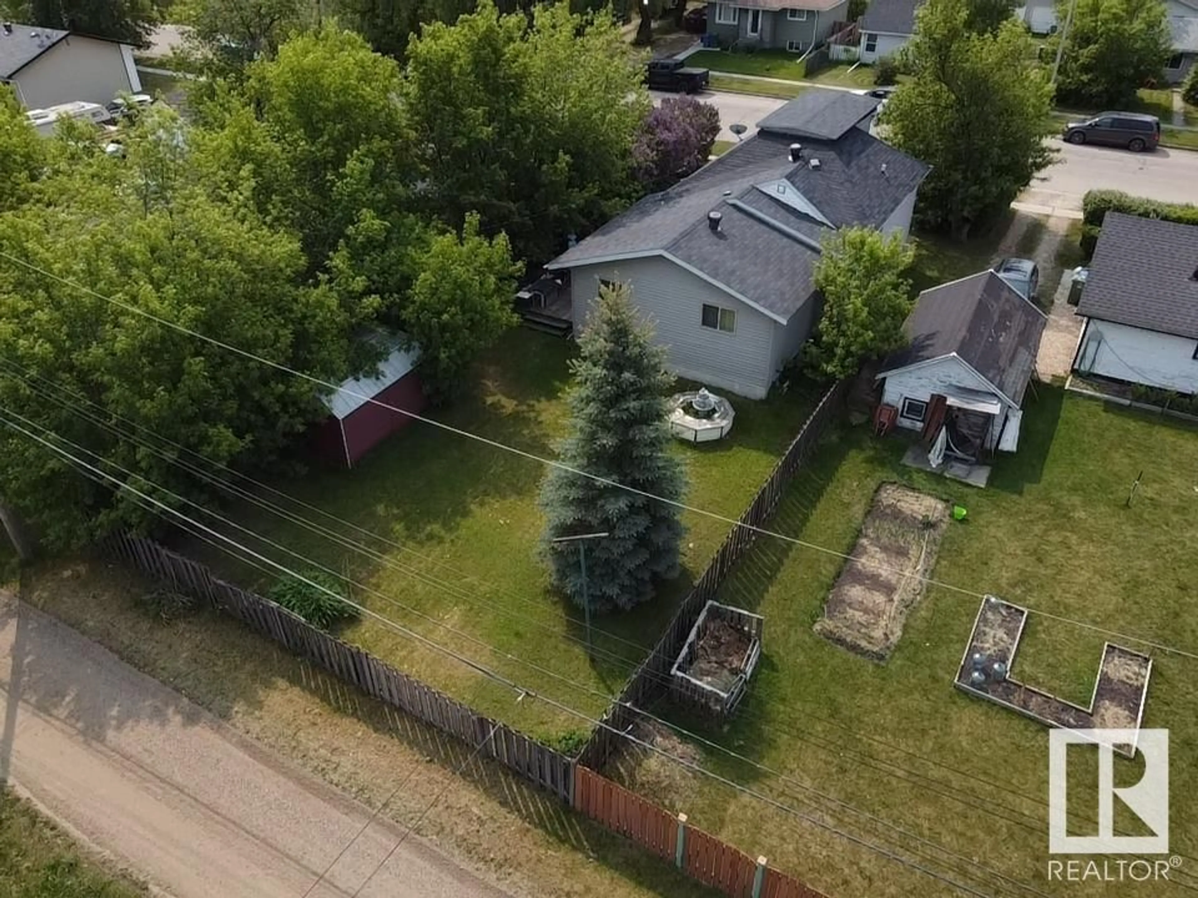 A pic from outside/outdoor area/front of a property/back of a property/a pic from drone, unknown for 4612 47 AV, Wetaskiwin Alberta T9A0J4