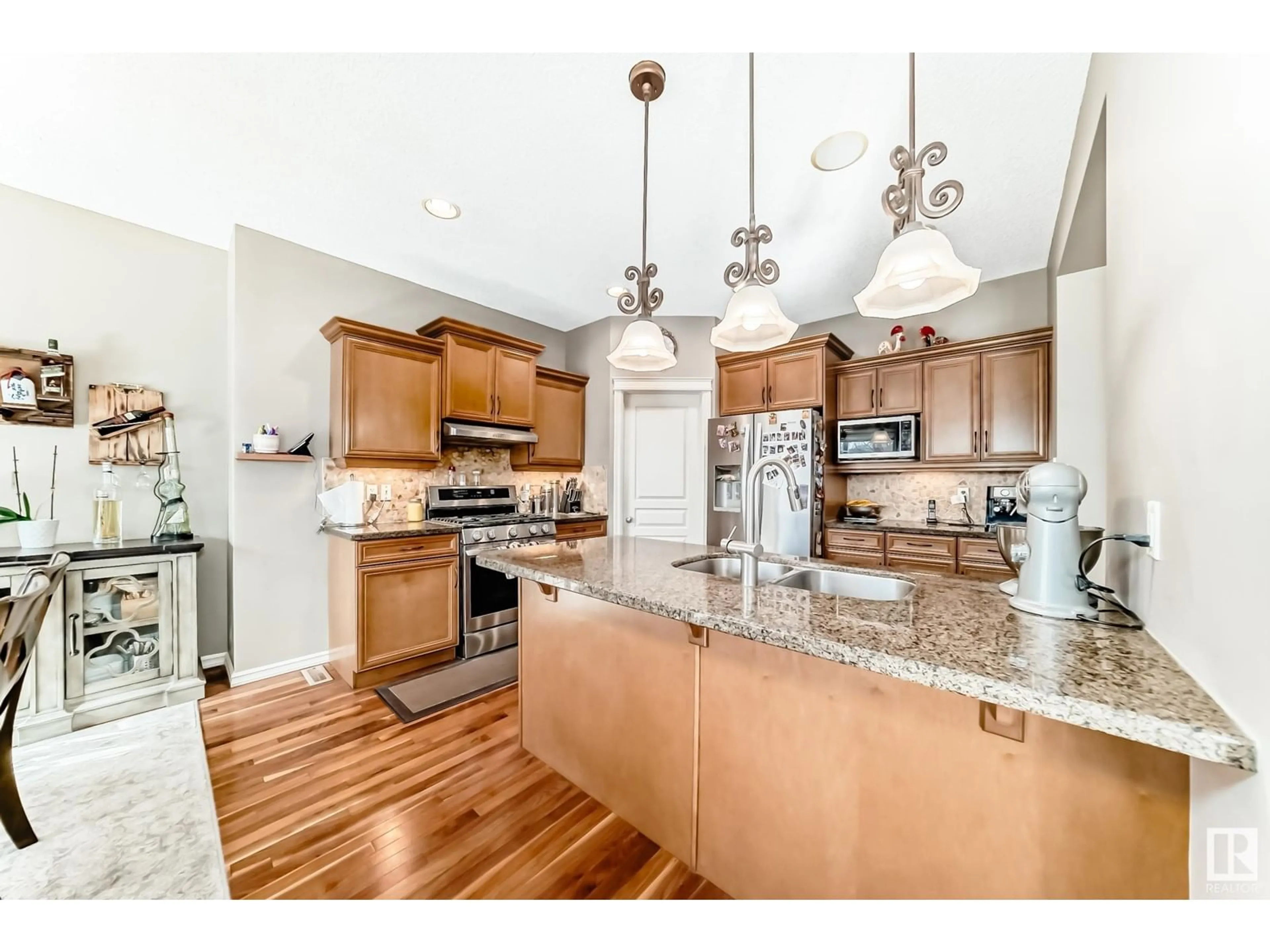 Open concept kitchen, unknown for 6908 STROM LN, Edmonton Alberta T6R0G3