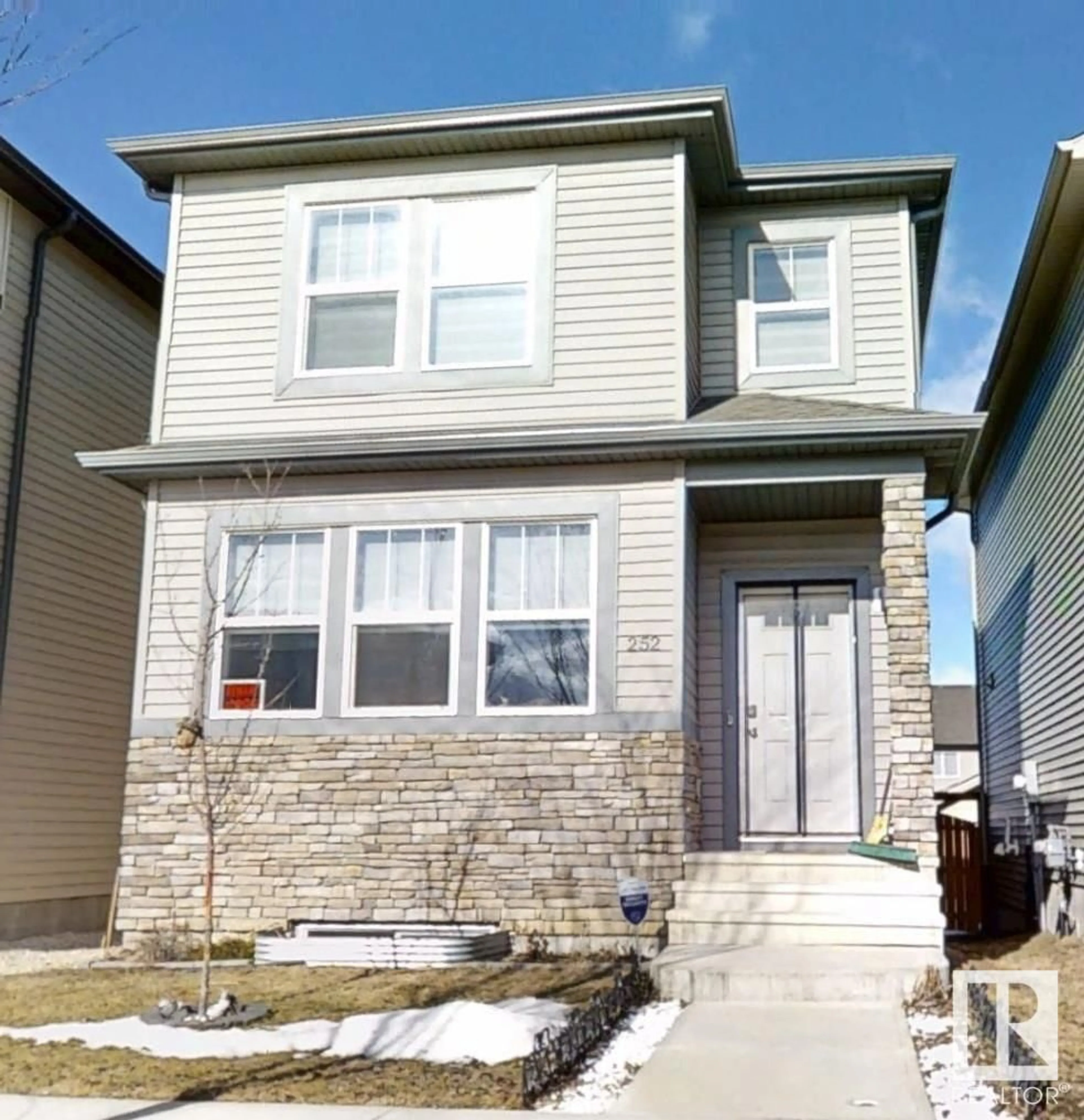 Home with vinyl exterior material, street for 252 41 AV, Edmonton Alberta T6T2E7