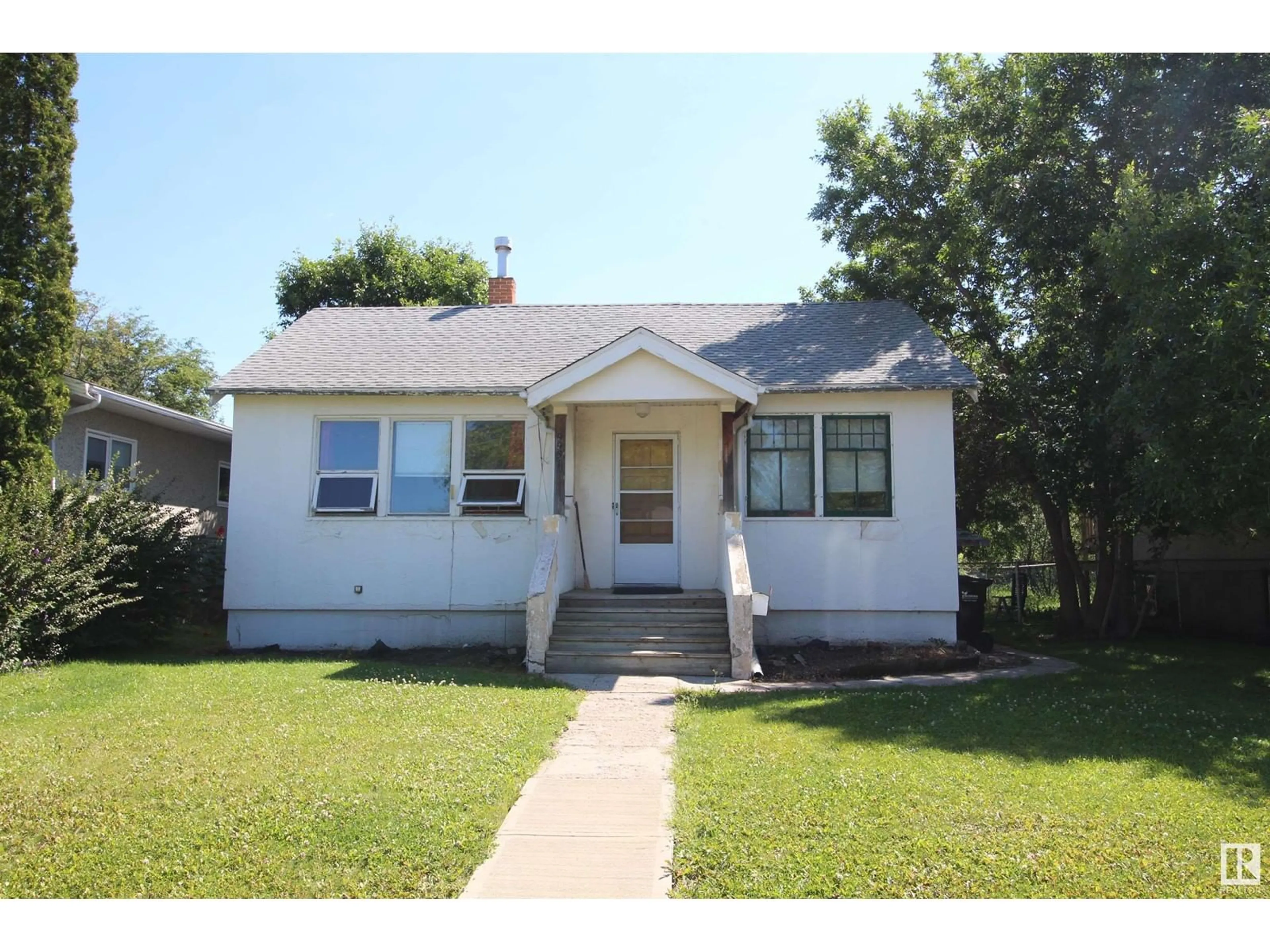 Home with vinyl exterior material, street for 9931 104 ST, Westlock Alberta T7P1T3