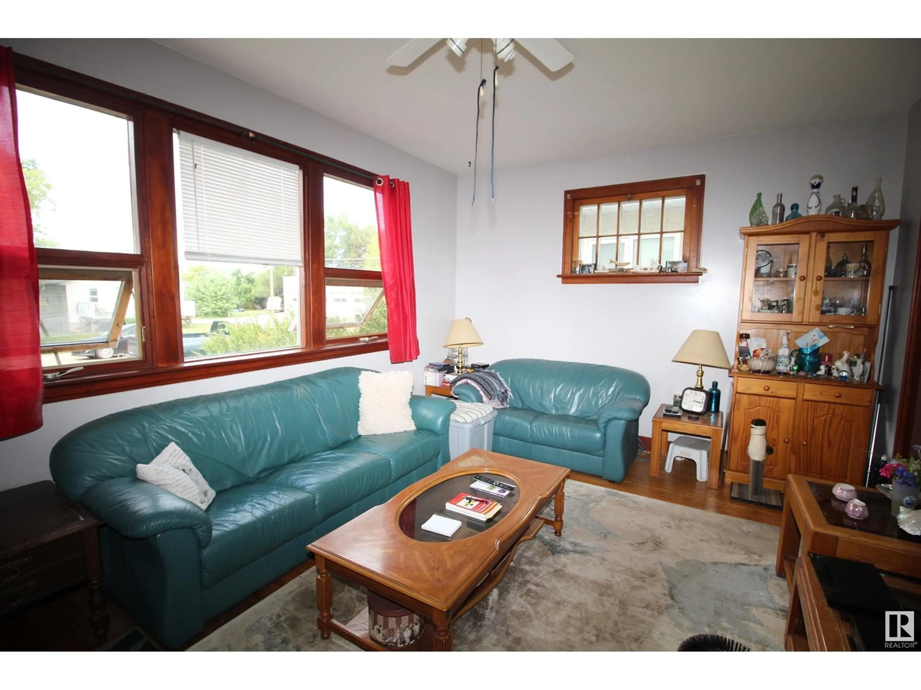 Living room with furniture, wood/laminate floor for 9931 104 ST, Westlock Alberta T7P1T3
