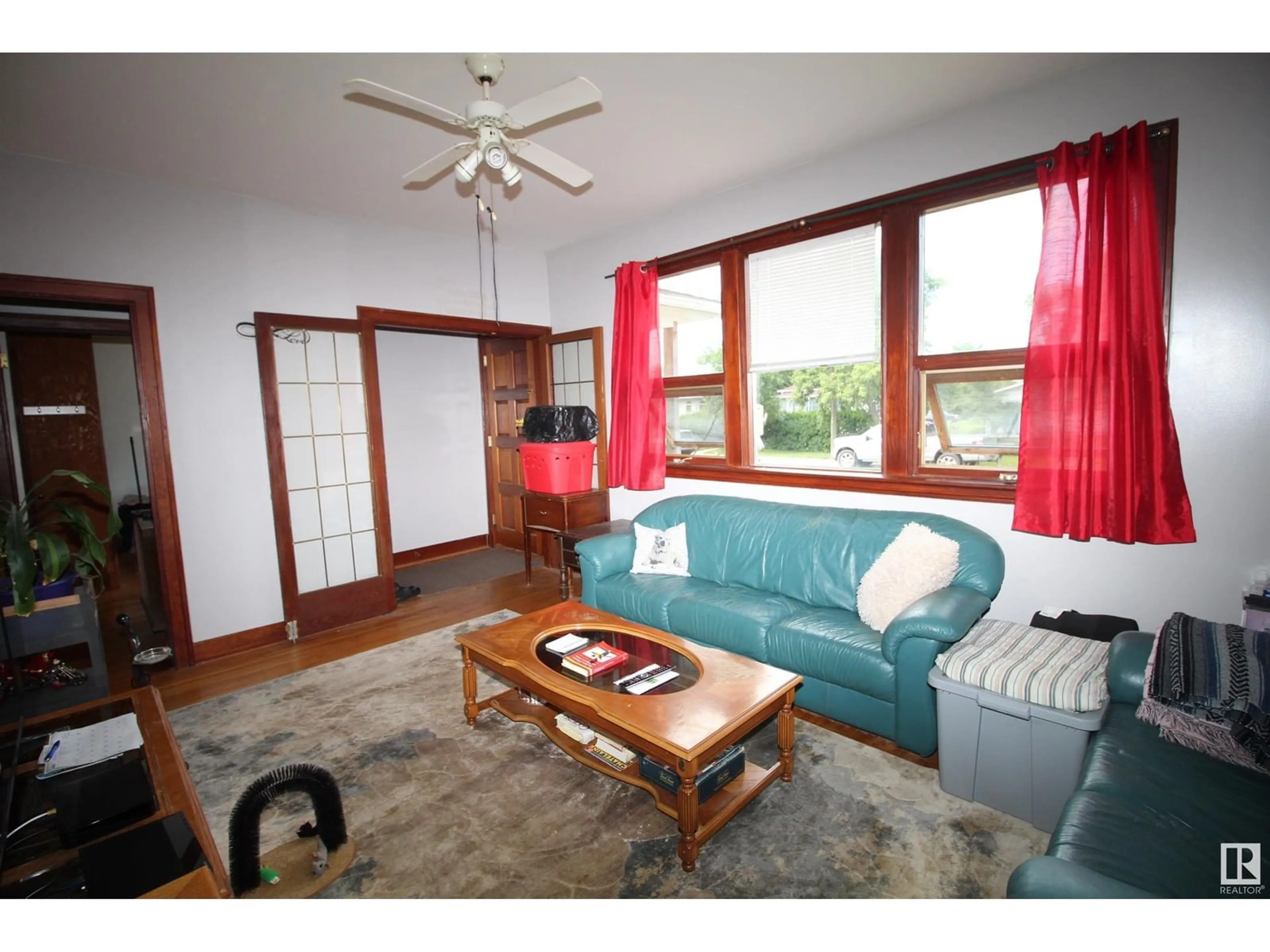 Living room with furniture, wood/laminate floor for 9931 104 ST, Westlock Alberta T7P1T3