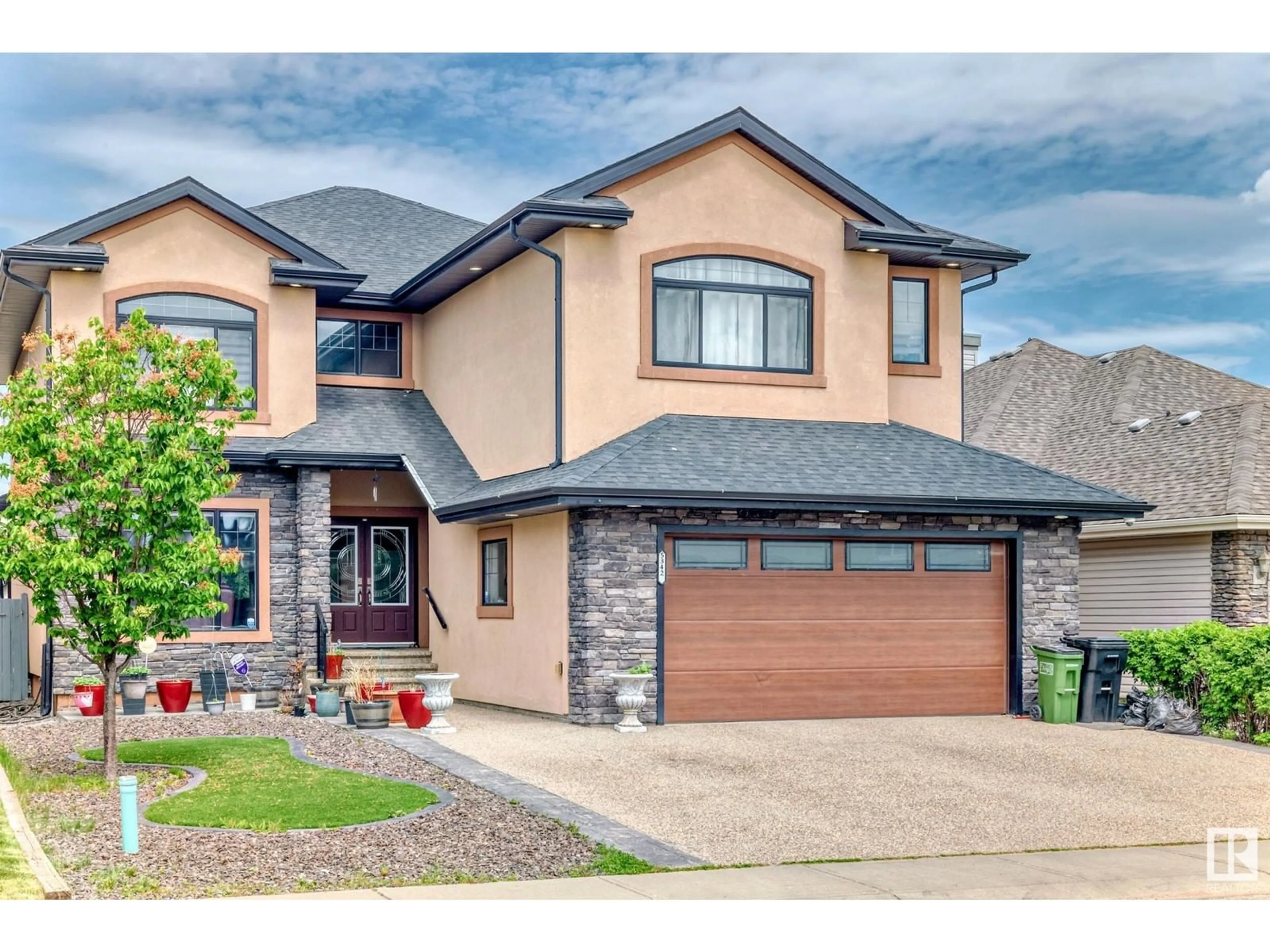 Home with brick exterior material, street for NW - 5342 MULLEN BN, Edmonton Alberta T6R0P9