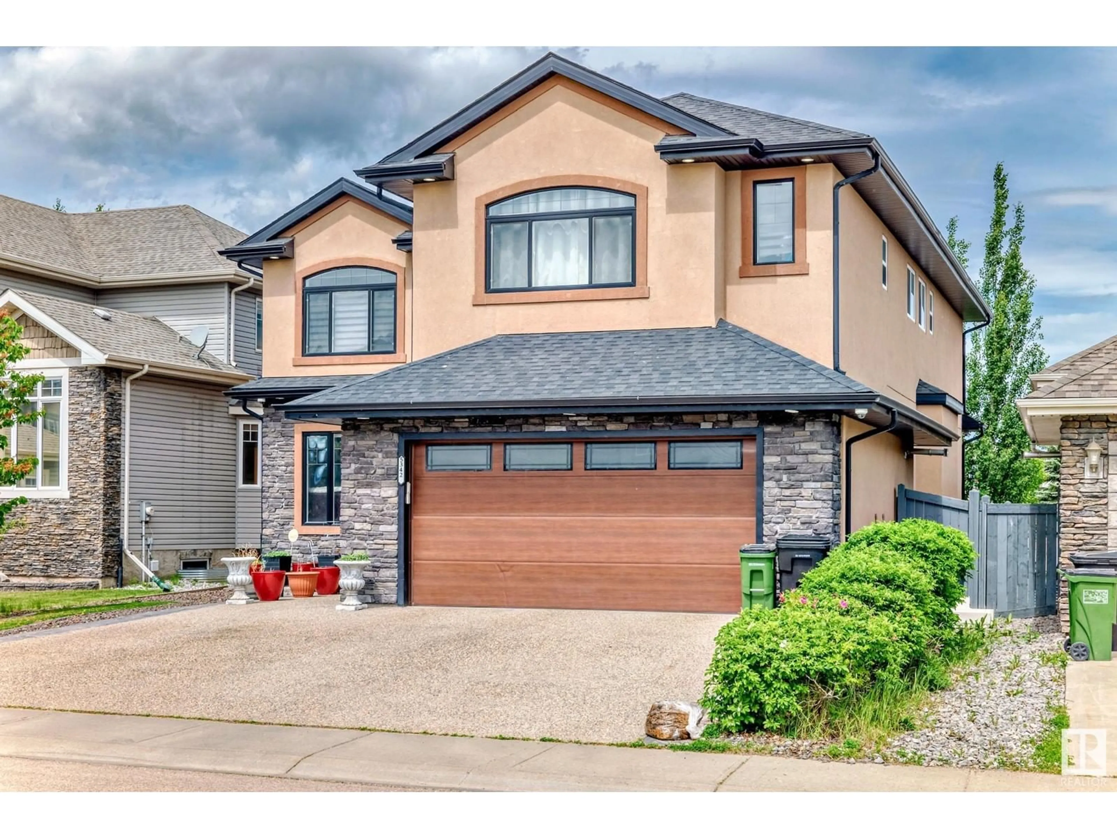 Home with brick exterior material, street for NW - 5342 MULLEN BN, Edmonton Alberta T6R0P9