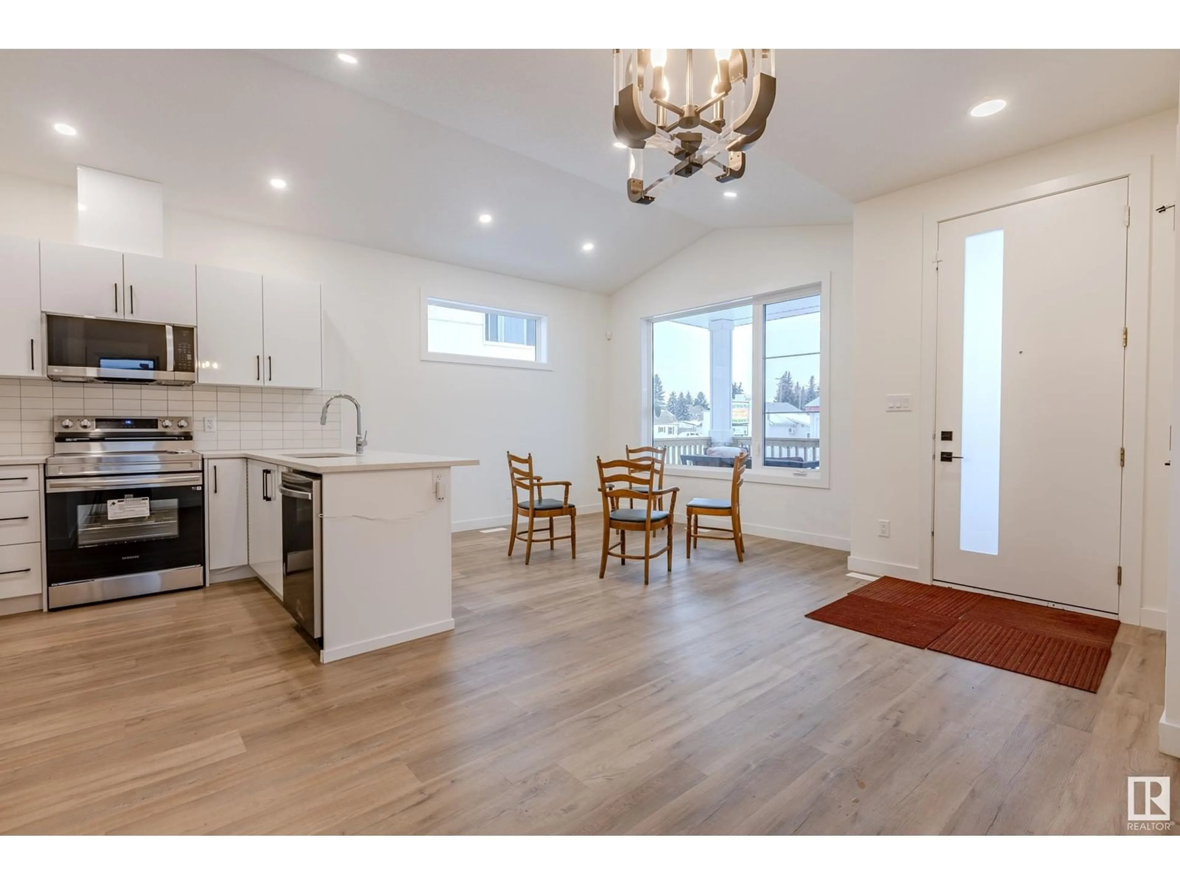 Open concept kitchen, wood/laminate floor for 4921 50 AV, Legal Alberta T0G1L0
