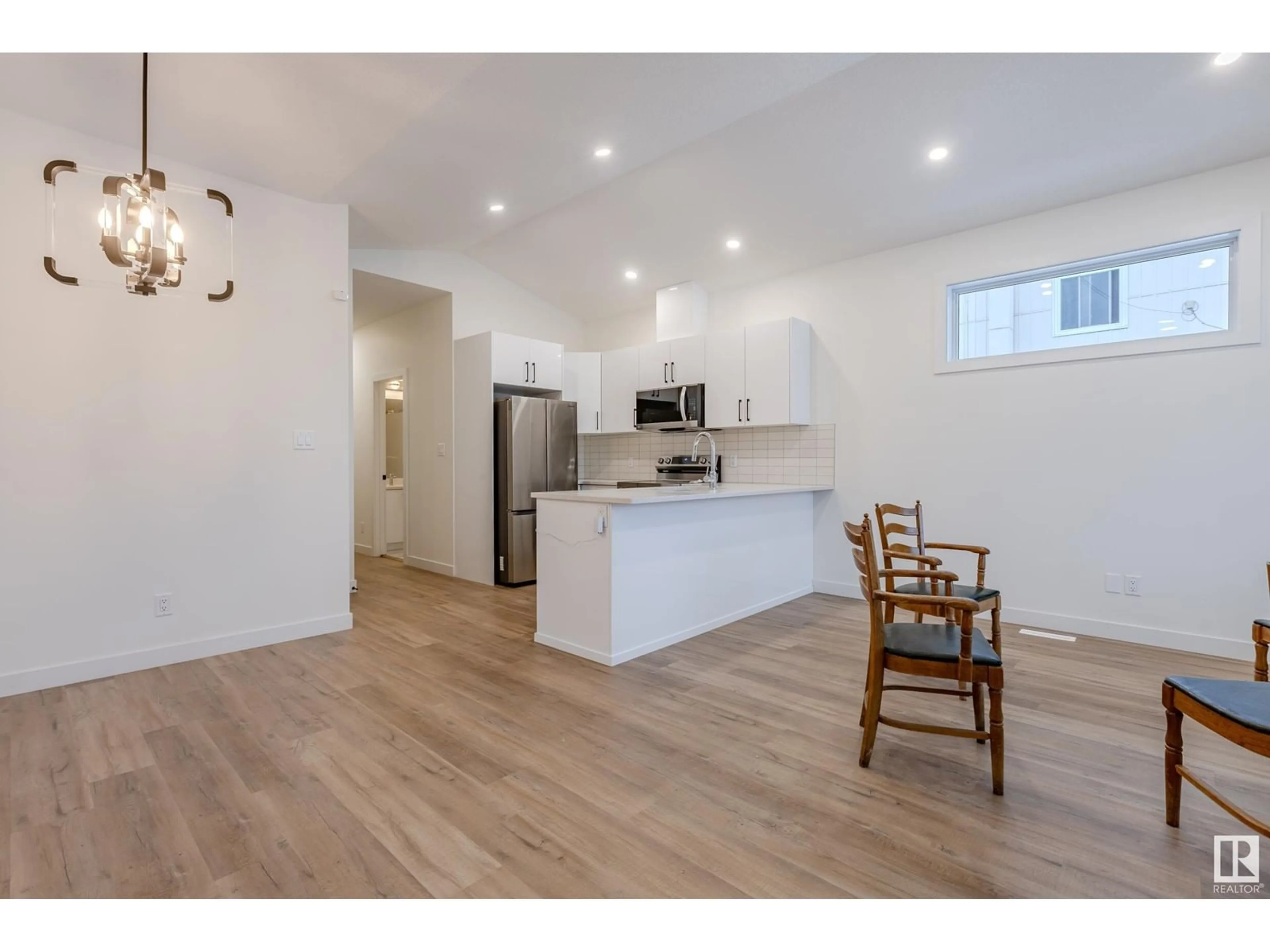 Open concept kitchen, wood/laminate floor for 4921 50 AV, Legal Alberta T0G1L0
