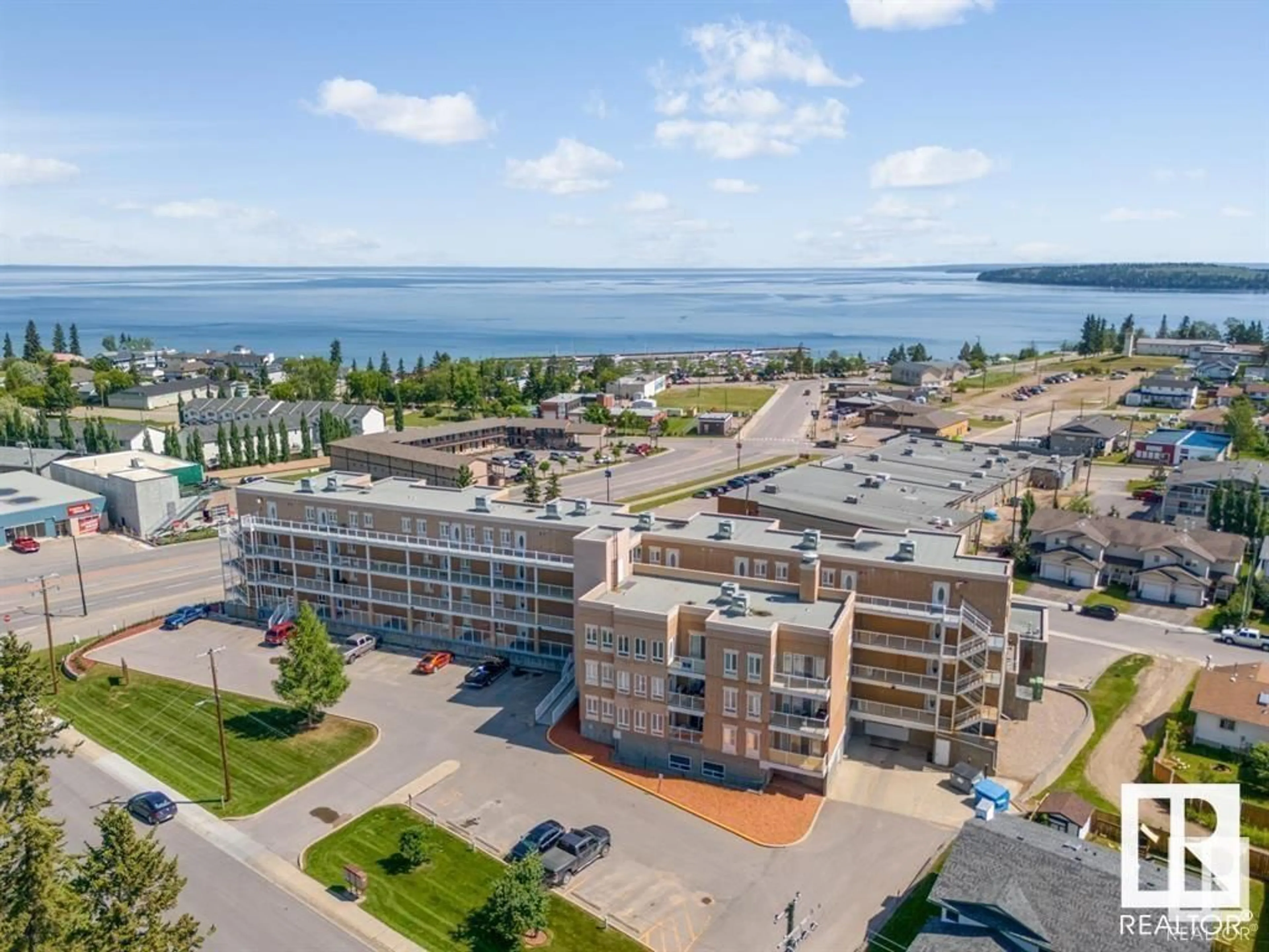 A pic from outside/outdoor area/front of a property/back of a property/a pic from drone, water/lake/river/ocean view for 802 - 308 12 ST, Cold Lake Alberta T9M0A7