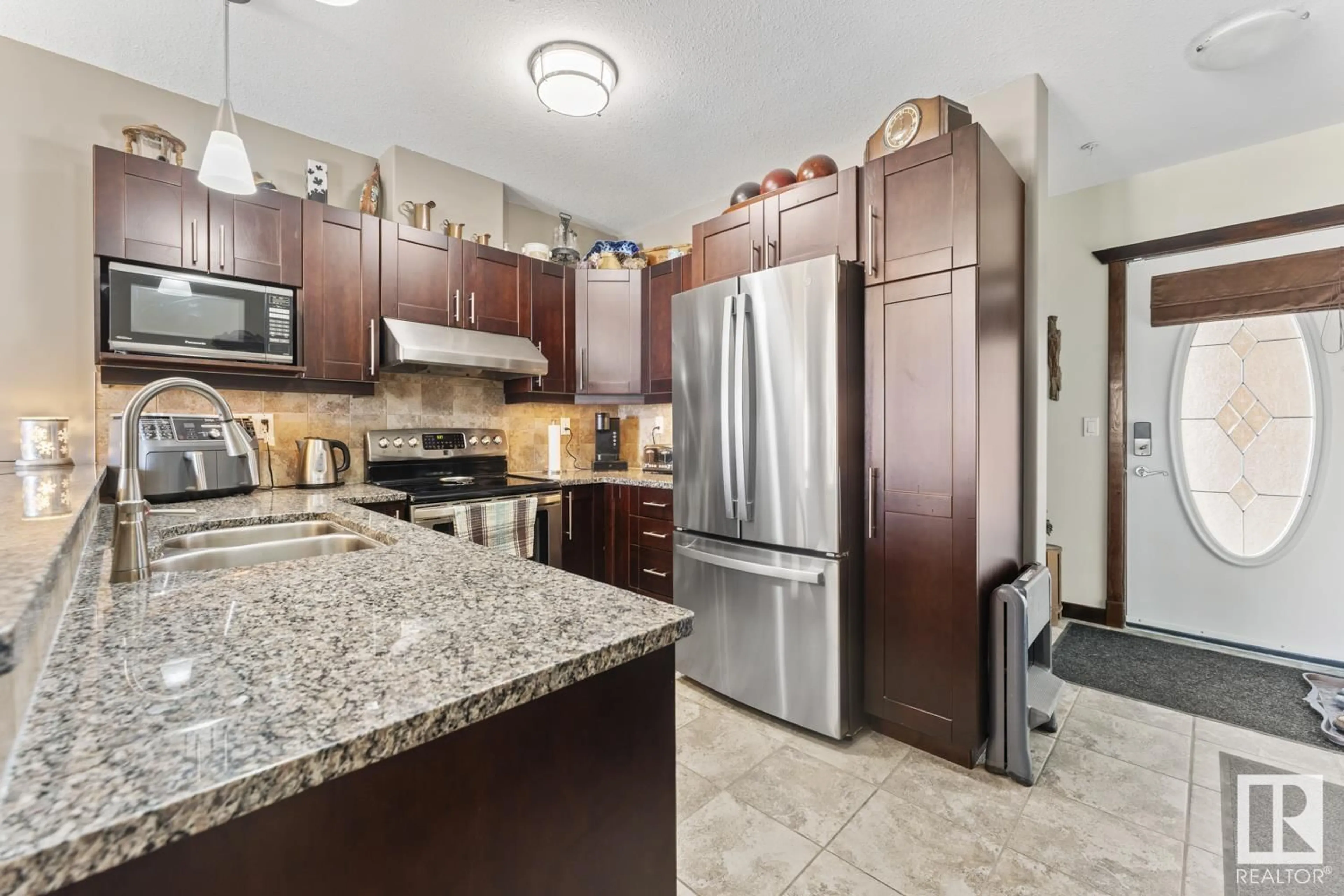 Open concept kitchen, ceramic/tile floor for 802 - 308 12 ST, Cold Lake Alberta T9M0A7