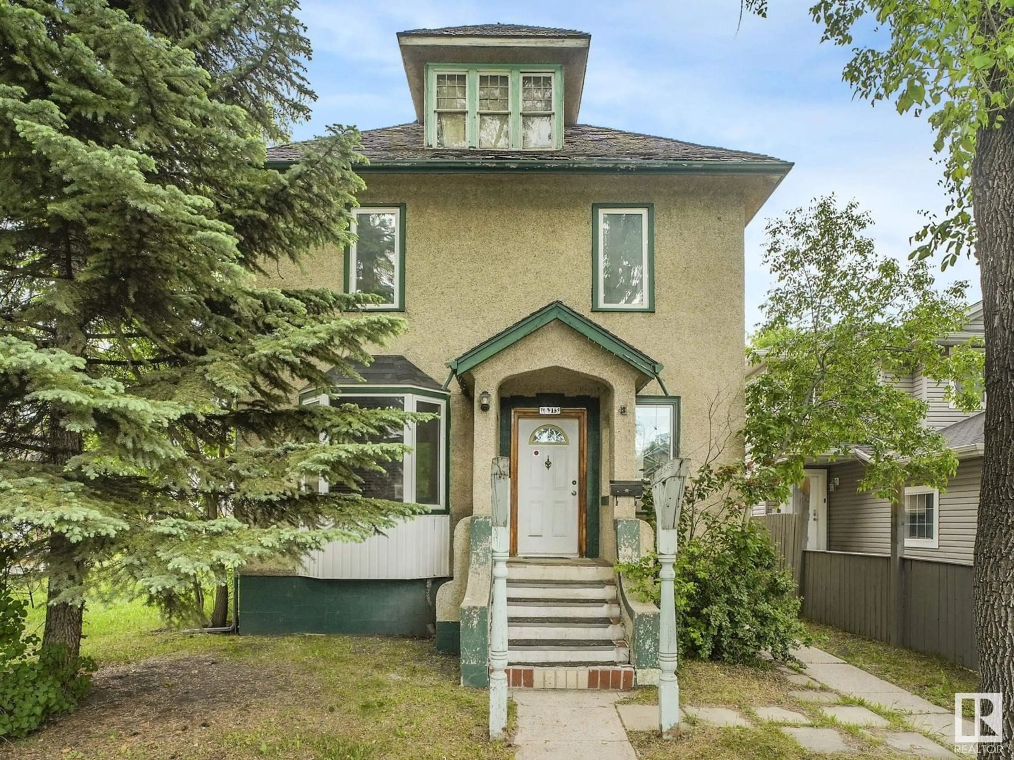 Home with brick exterior material, street for NW - 10713 93 ST, Edmonton Alberta T5H1Y2