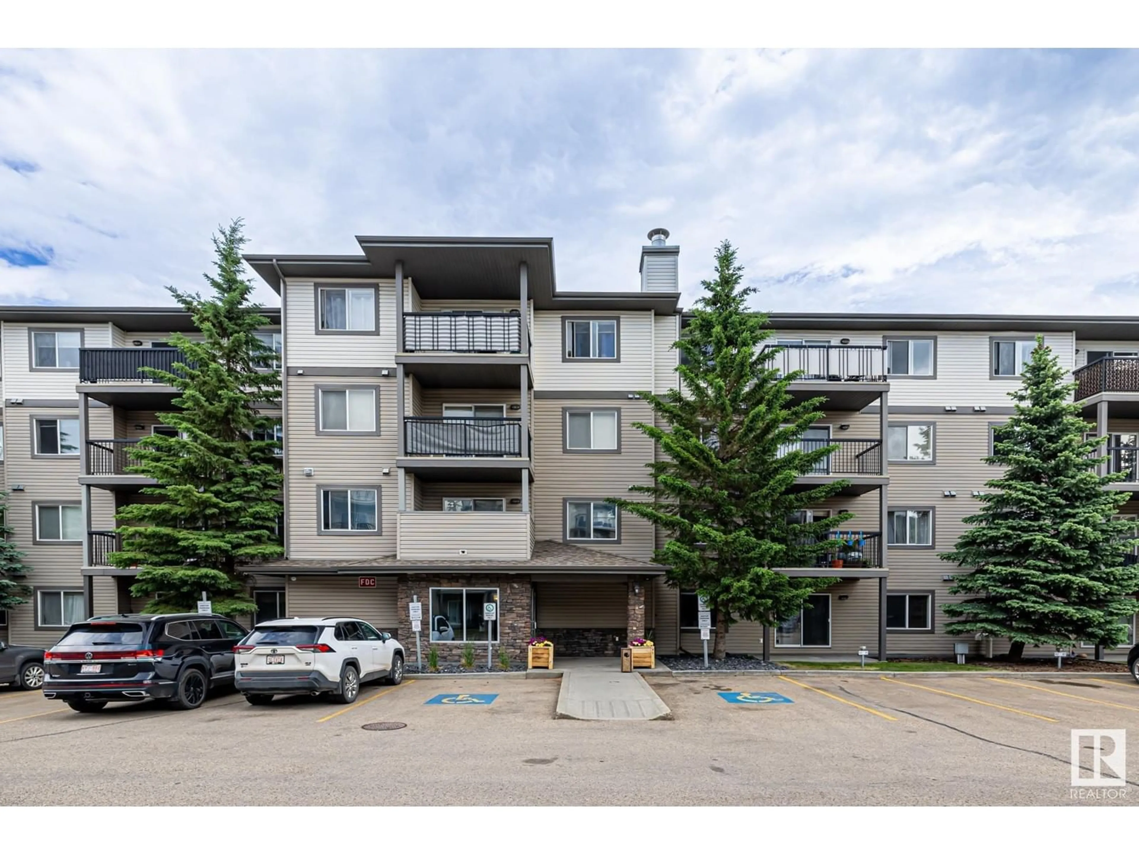 A pic from outside/outdoor area/front of a property/back of a property/a pic from drone, unknown for 204 - 1188 HYNDMAN RD, Edmonton Alberta T5A0E9