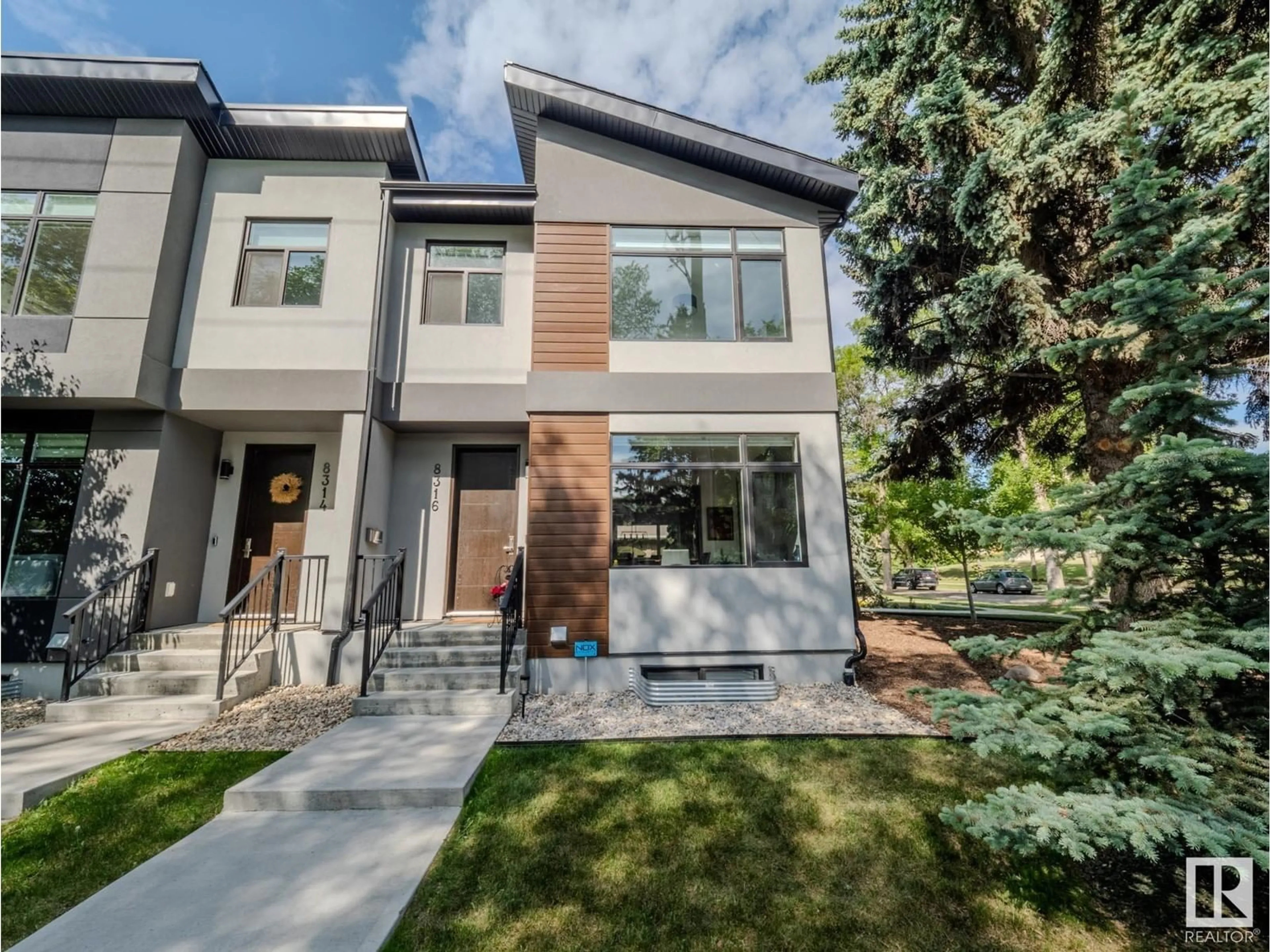 Home with brick exterior material, street for NW - 8316 89 ST, Edmonton Alberta T6C1B5