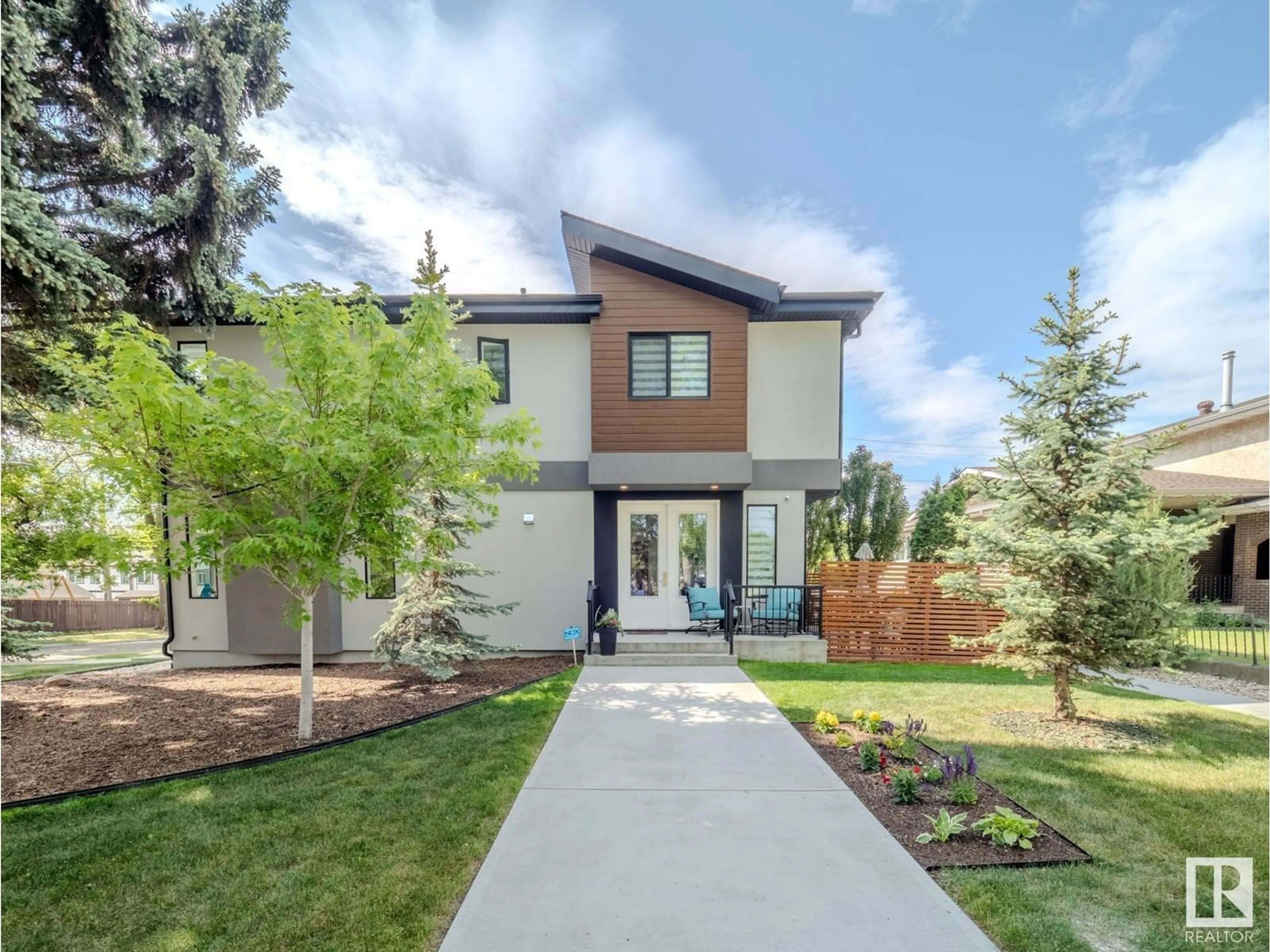 Home with brick exterior material, street for NW - 8316 89 ST, Edmonton Alberta T6C1B5