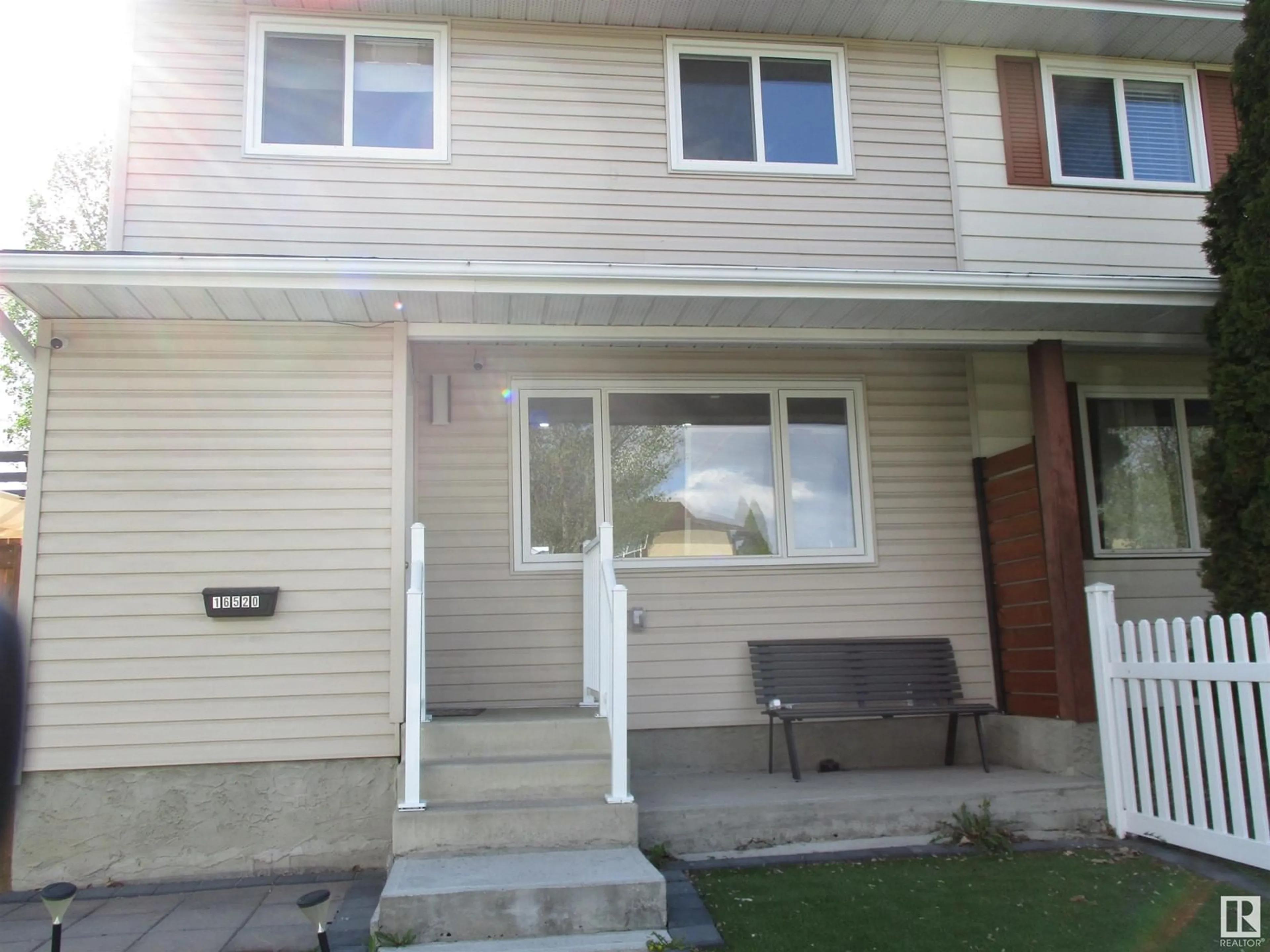 Home with vinyl exterior material, street for NW - 16520 115 ST, Edmonton Alberta T5X3V4