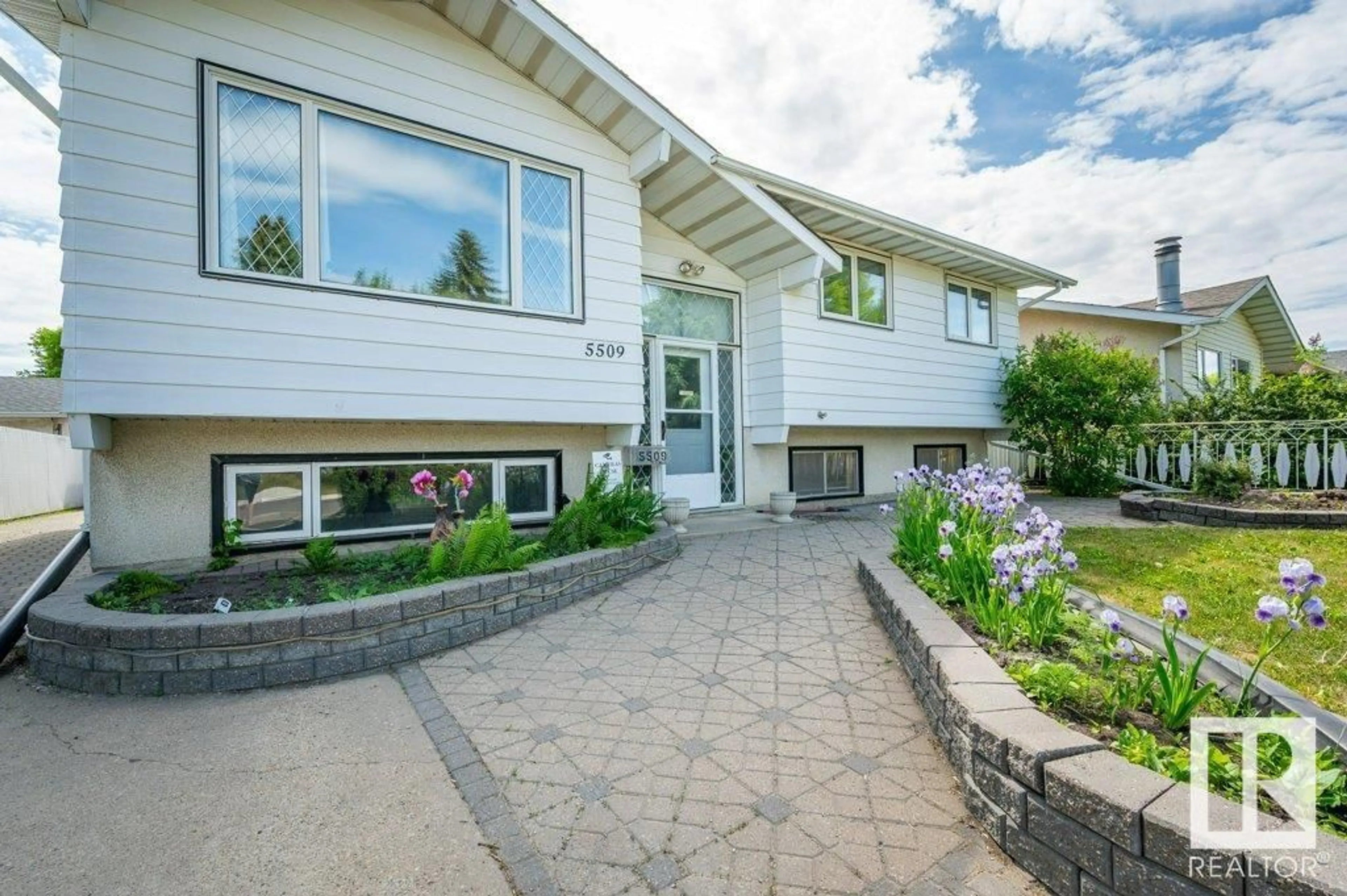 Home with vinyl exterior material, street for 5509 53 ST, Leduc Alberta T9E5N9